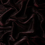 Draped Black Cherry Sheer Square Shimmer Stretch Tulle Fabric showing a geometric reflective grid across fluid folds