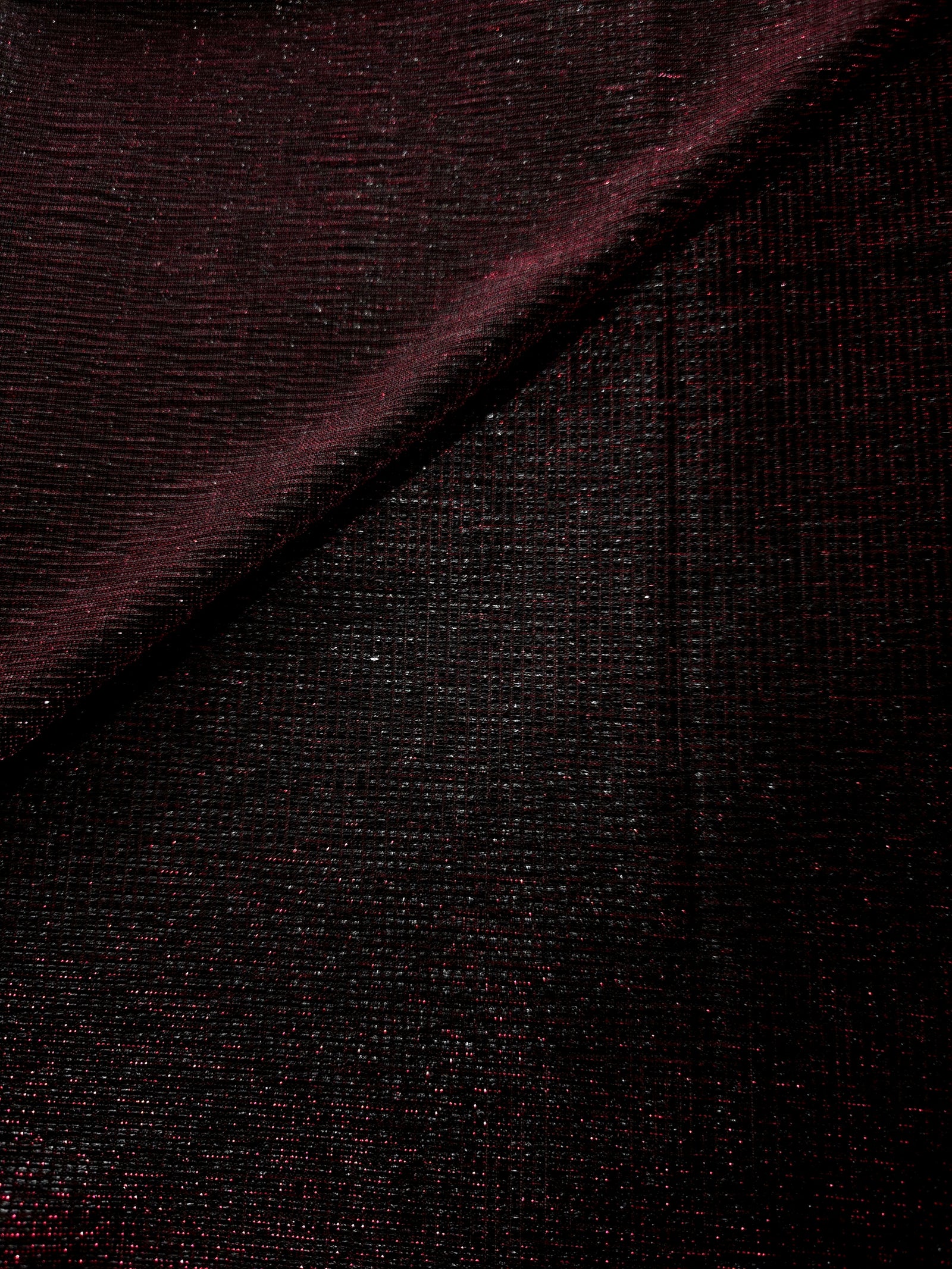 Front and back of Black Cherry Sheer Square Shimmer Stretch Tulle Fabric showing square motif, sheer knit base and flexible stretch