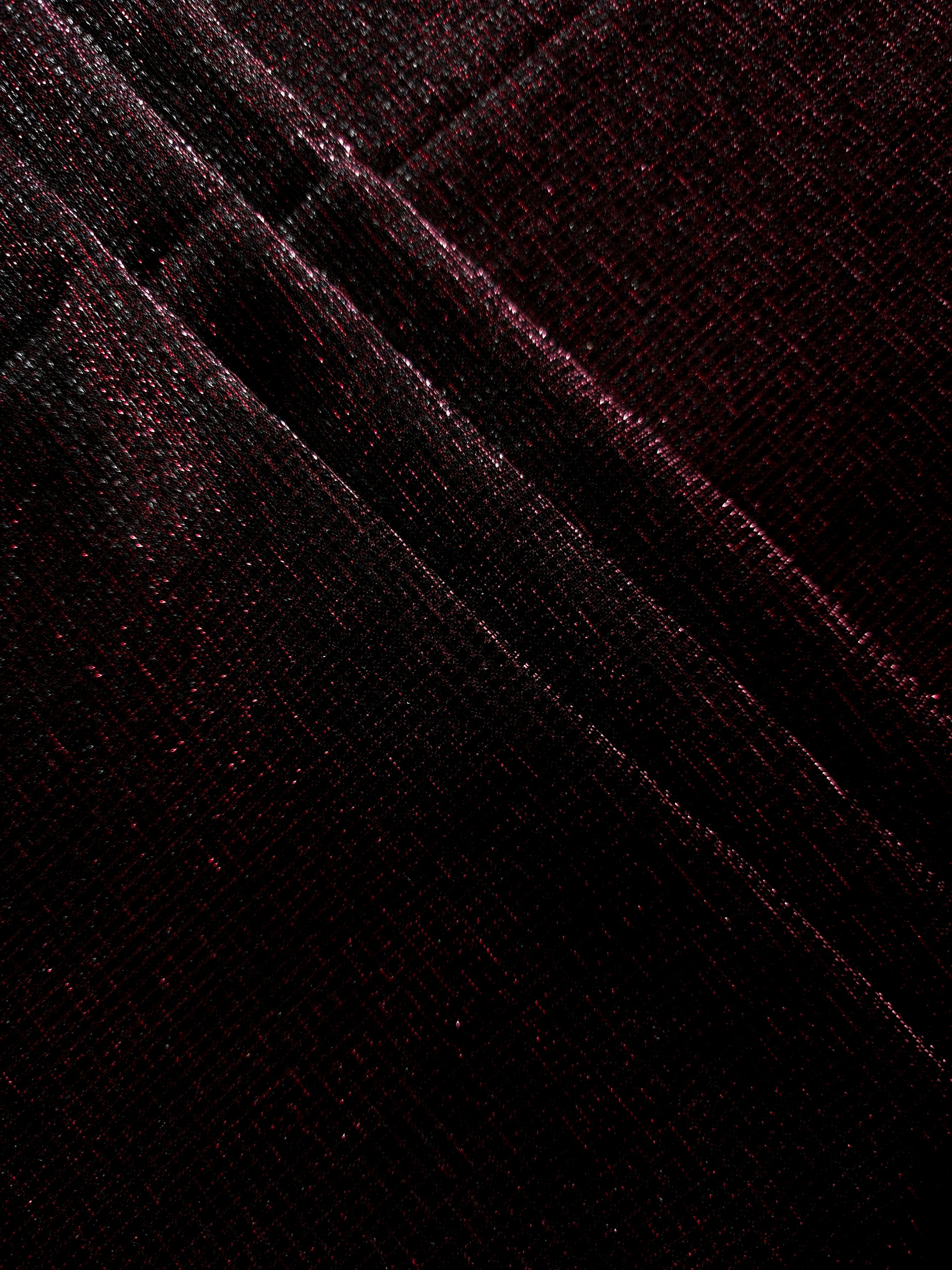 Layered Black Cherry Sheer Square Shimmer Stretch Tulle Fabric showing overlapping geometry, denser shimmer and translucent depth