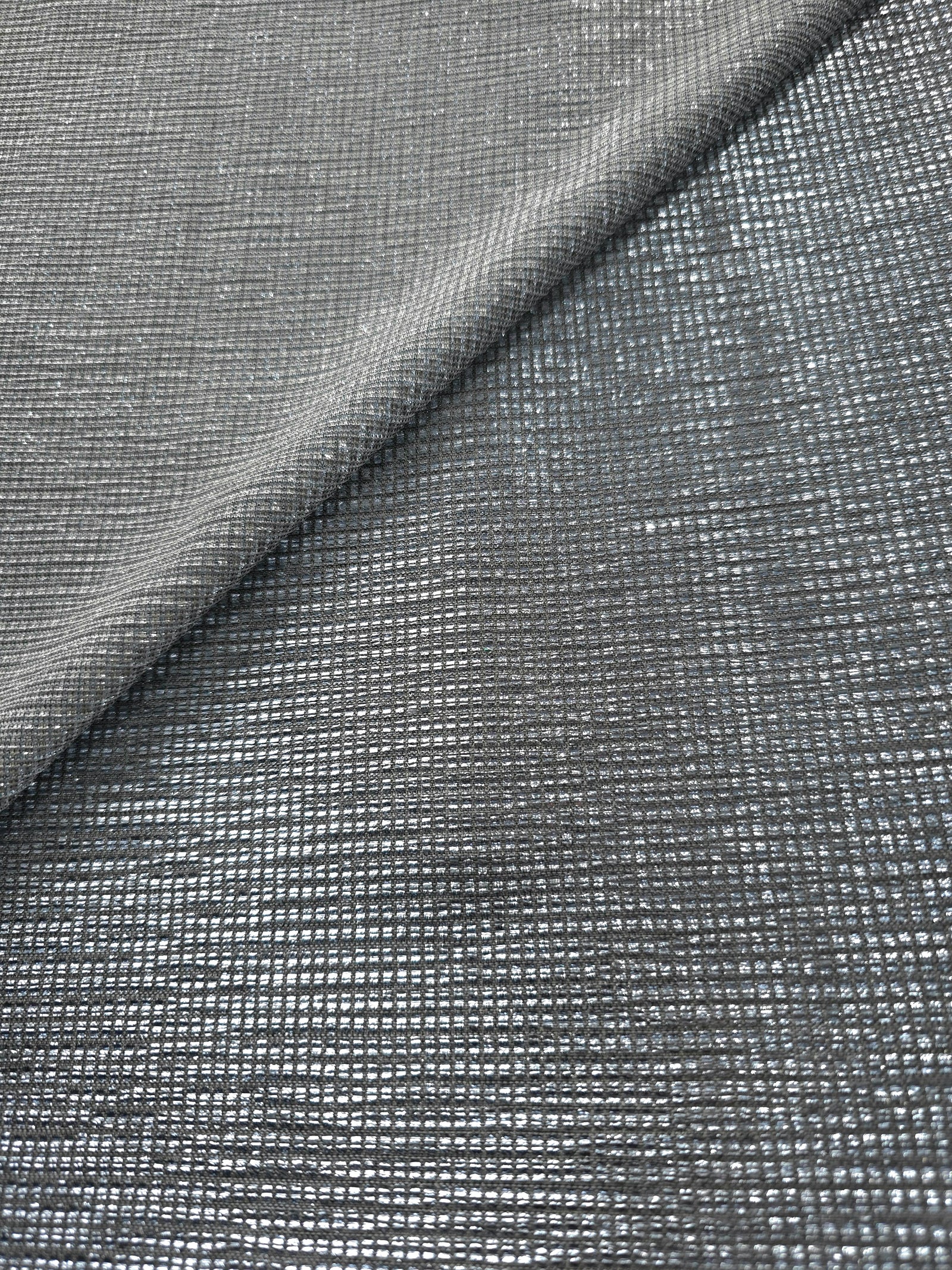 Front and back of Bright Silver Sheer Square Shimmer Stretch Tulle Fabric showing square motif, sheer knit base and flexible stretch