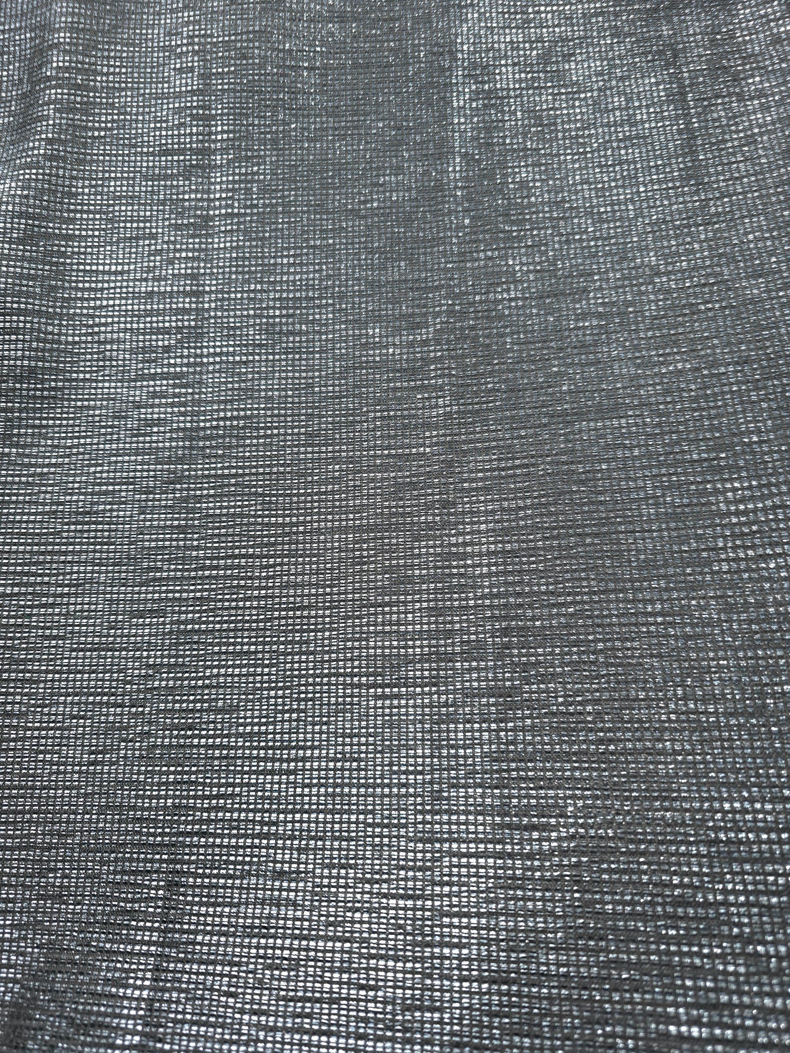 Surface detail of Bright Silver Sheer Square Shimmer Stretch Tulle Fabric highlighting square grid scale and lightweight tulle texture
