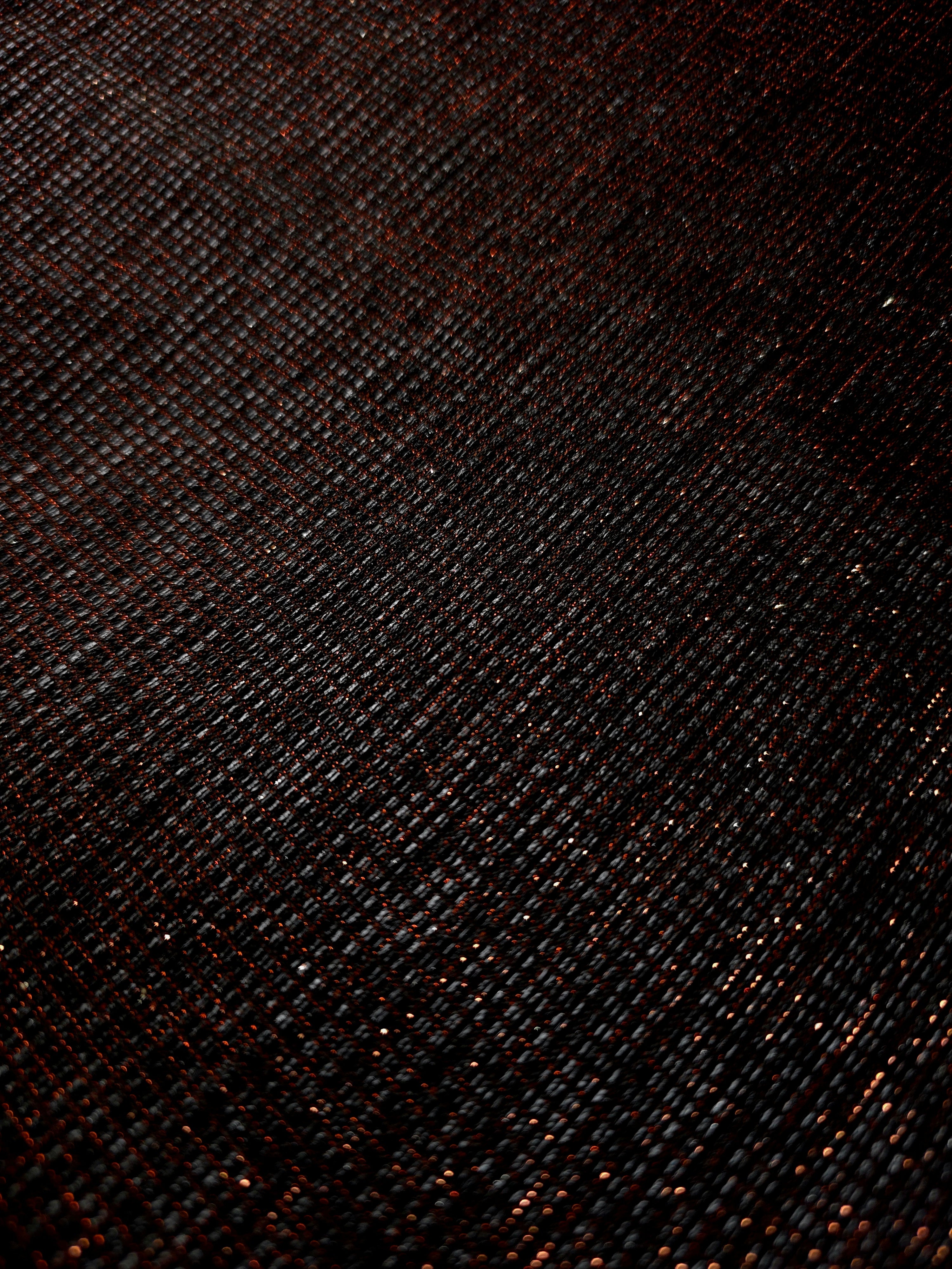 Close-up of Burnt Copper Sheer Square Shimmer Stretch Tulle Fabric revealing the square shimmer repeat and fine transparent mesh