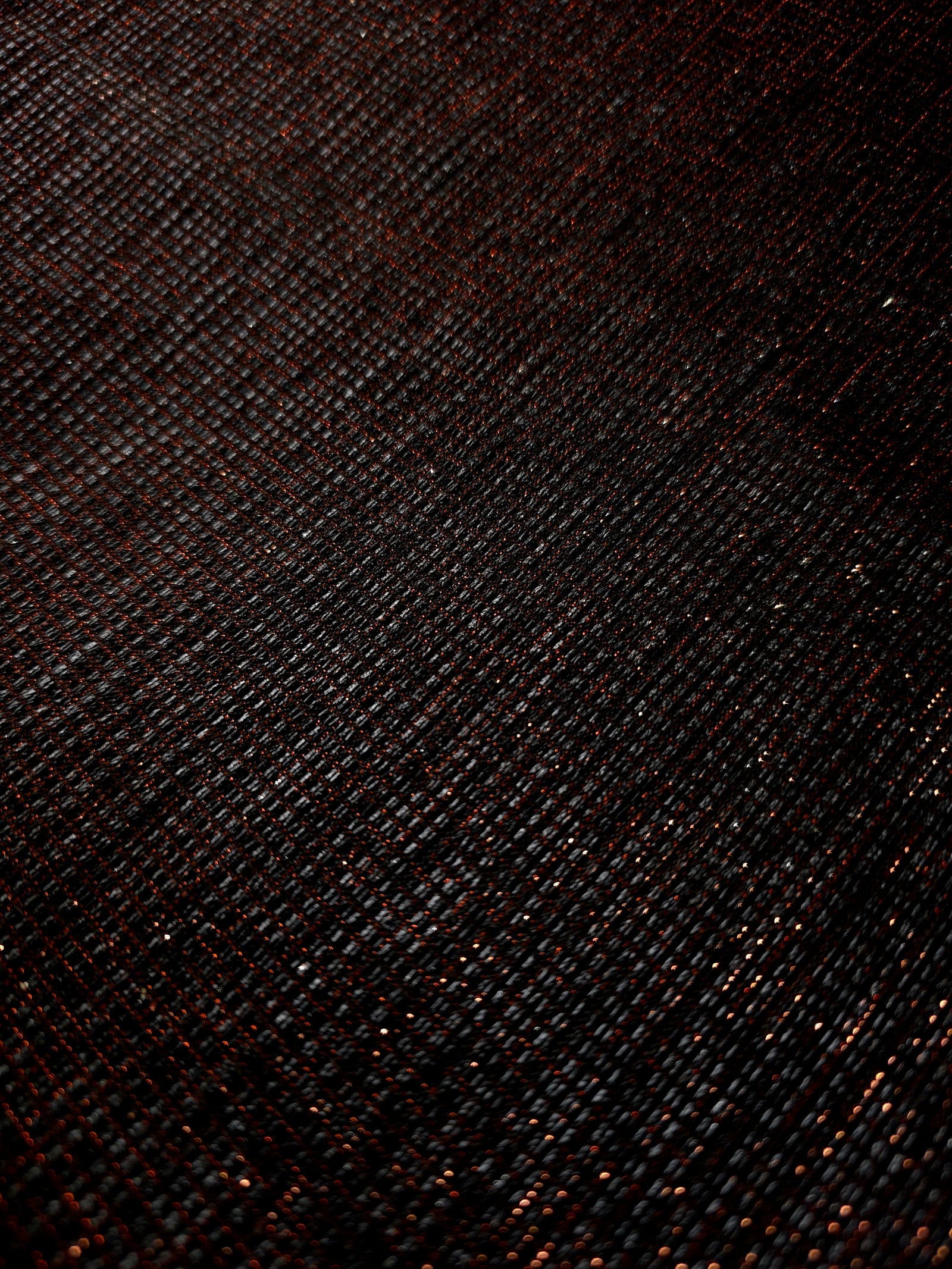 Close-up of Burnt Copper Sheer Square Shimmer Stretch Tulle Fabric revealing the square shimmer repeat and fine transparent mesh