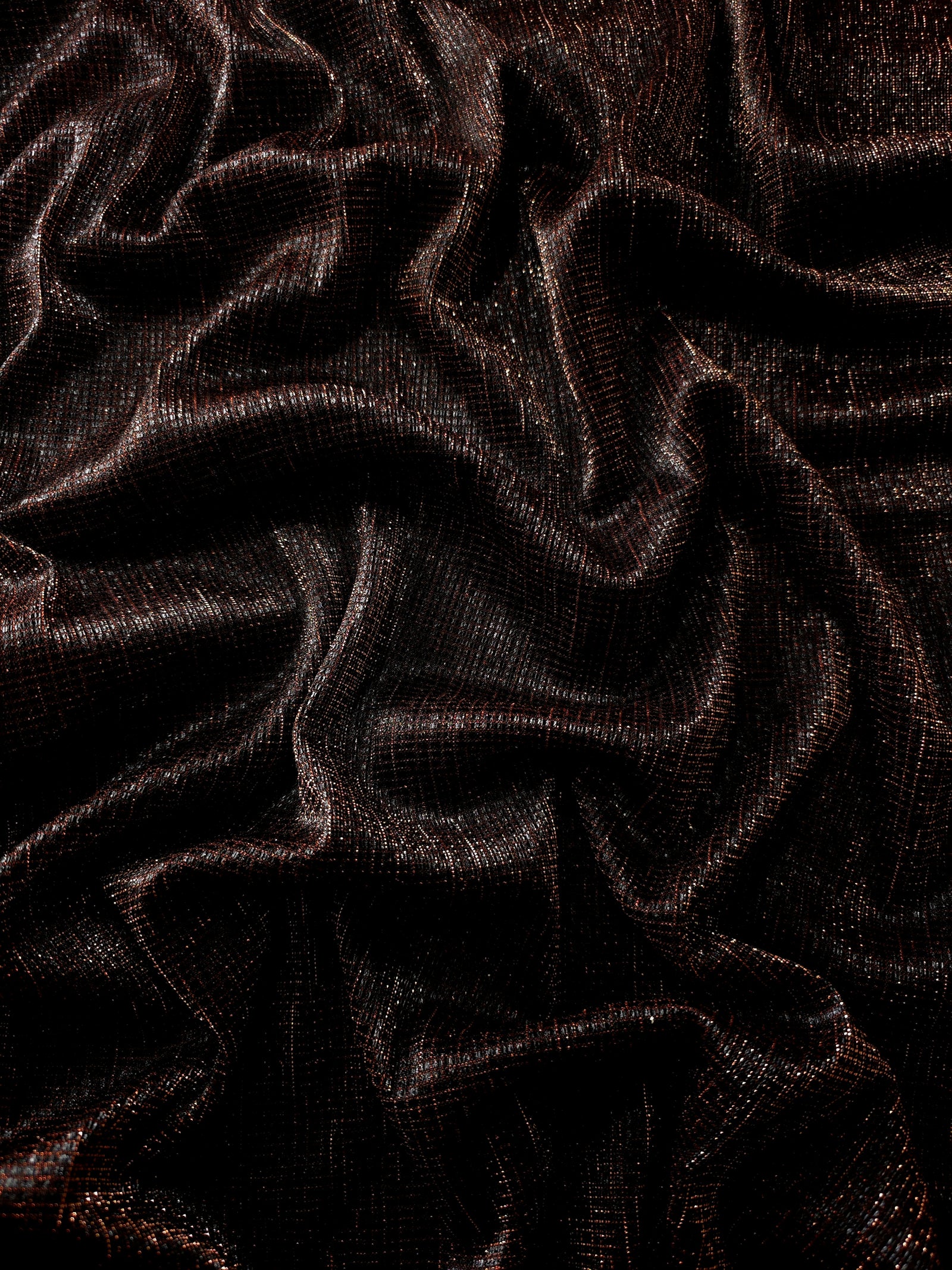 Draped Burnt Copper Sheer Square Shimmer Stretch Tulle Fabric showing a geometric reflective grid across fluid folds