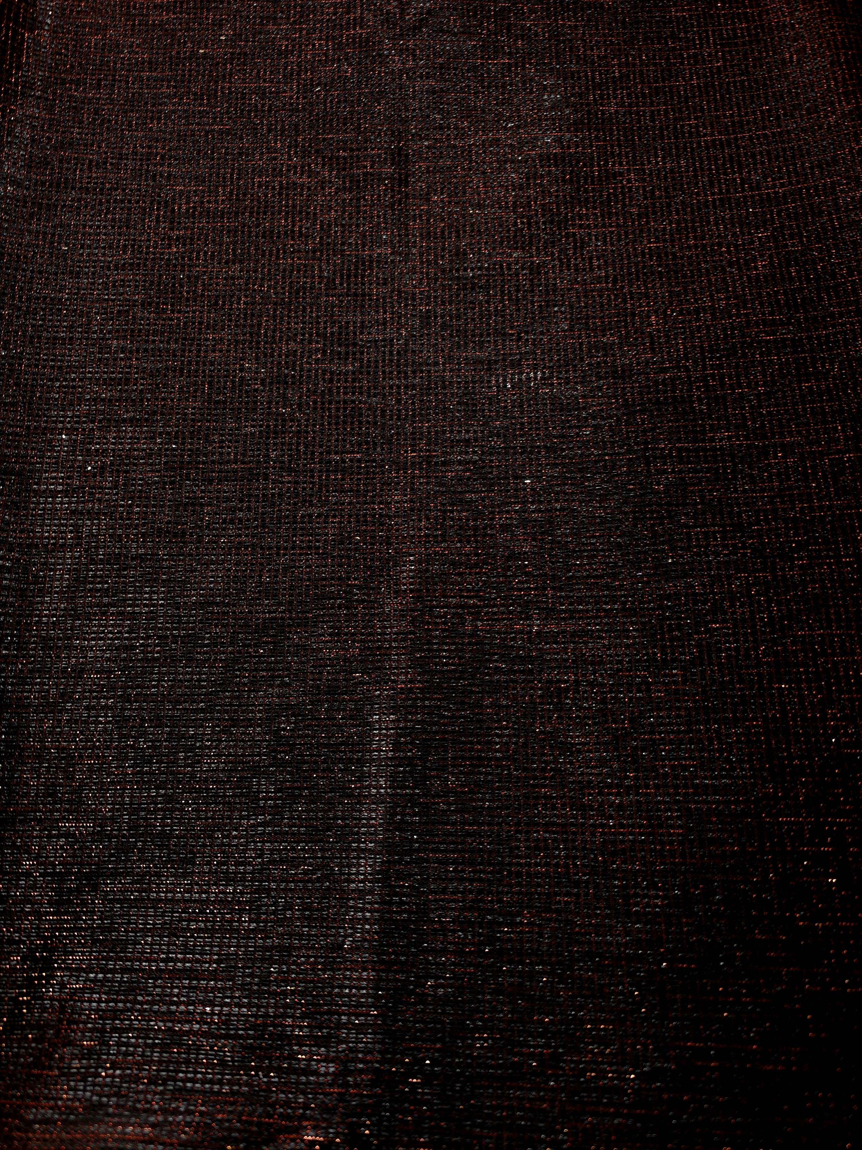 Surface detail of Burnt Copper Sheer Square Shimmer Stretch Tulle Fabric highlighting square grid scale and lightweight tulle texture