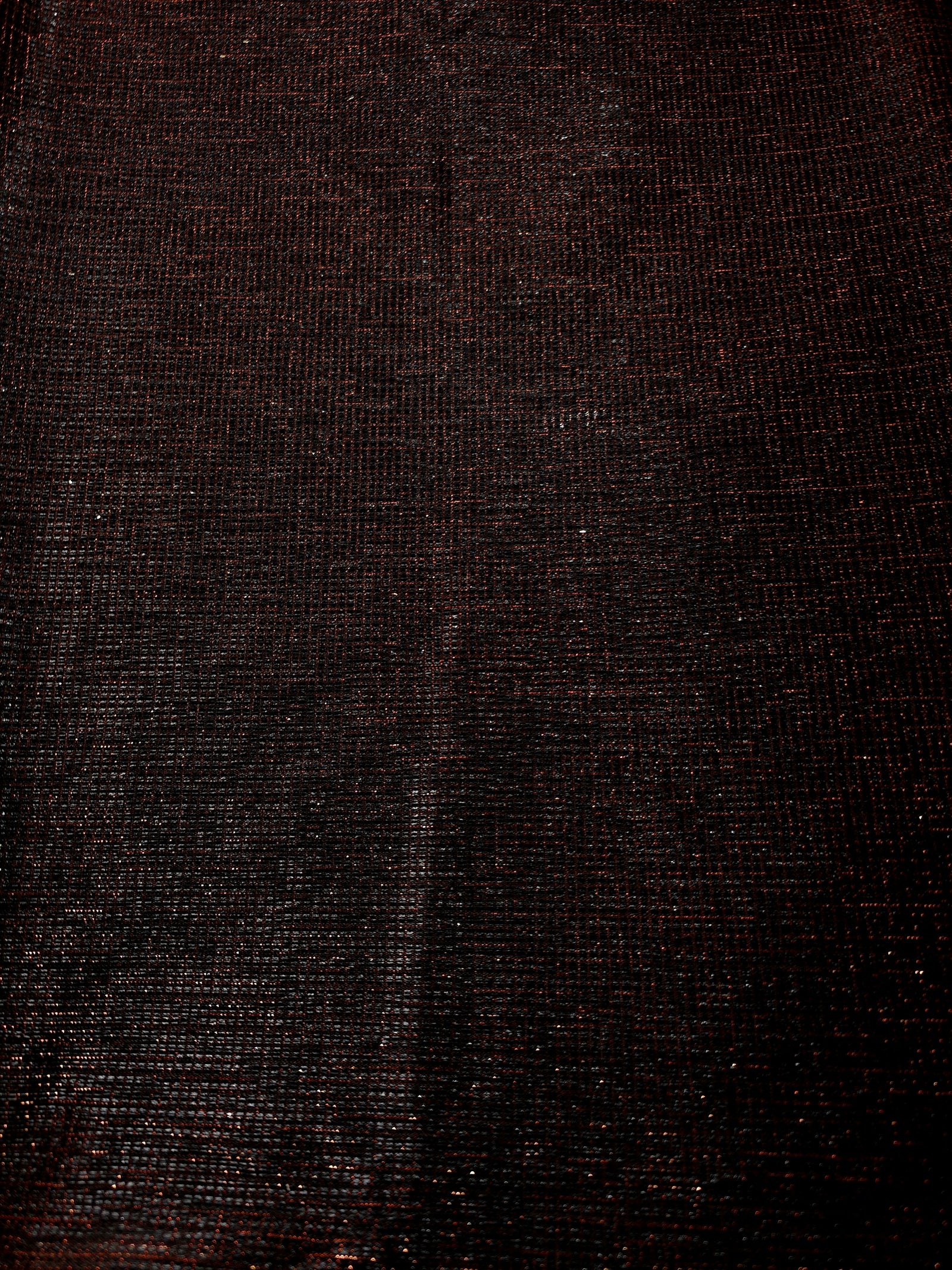 Surface detail of Burnt Copper Sheer Square Shimmer Stretch Tulle Fabric highlighting square grid scale and lightweight tulle texture