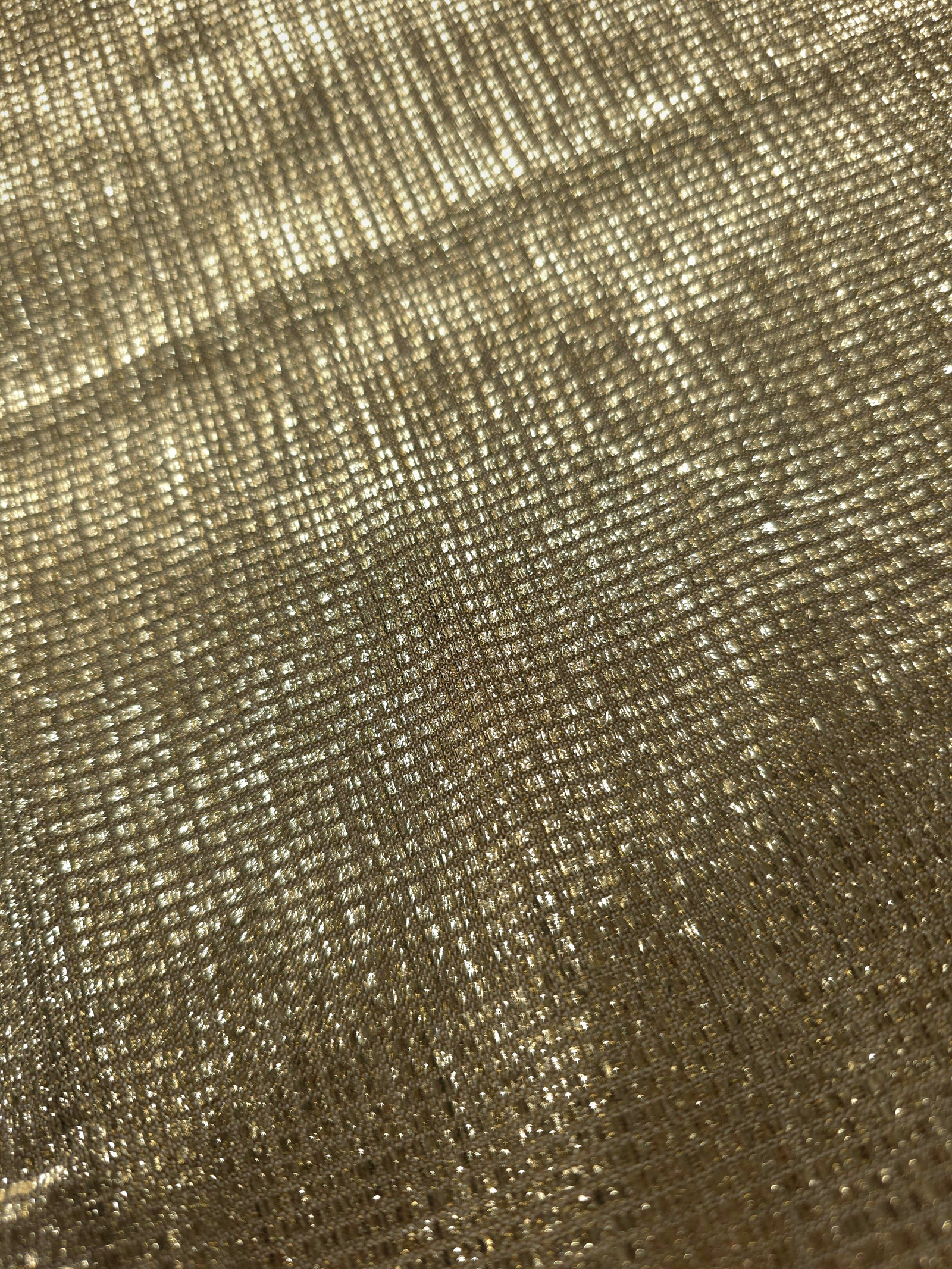 Close-up of Champagne Gold Sheer Square Shimmer Stretch Tulle Fabric revealing the square shimmer repeat and fine transparent mesh
