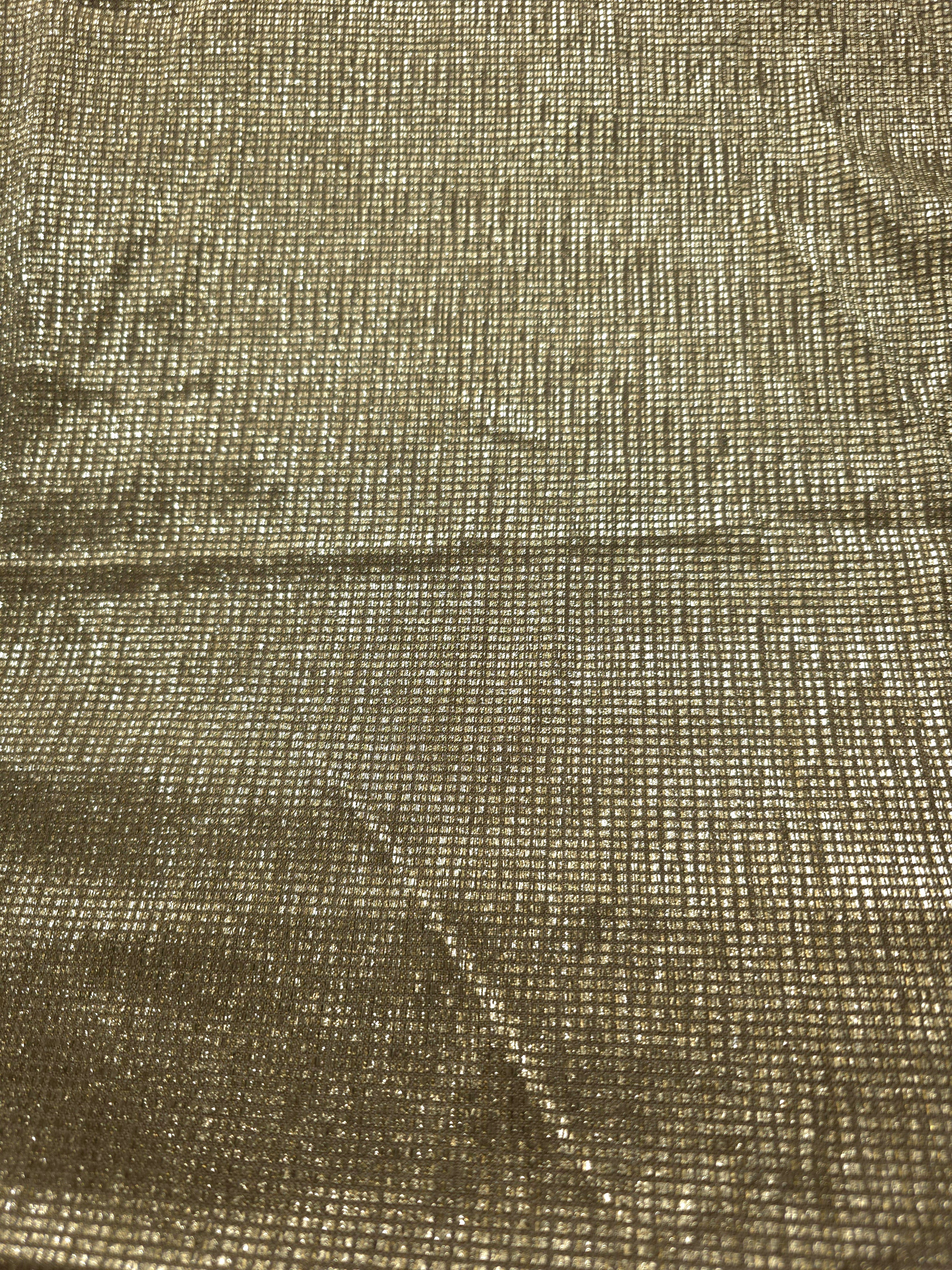 Surface detail of Champagne Gold Sheer Square Shimmer Stretch Tulle Fabric highlighting square grid scale and lightweight tulle texture