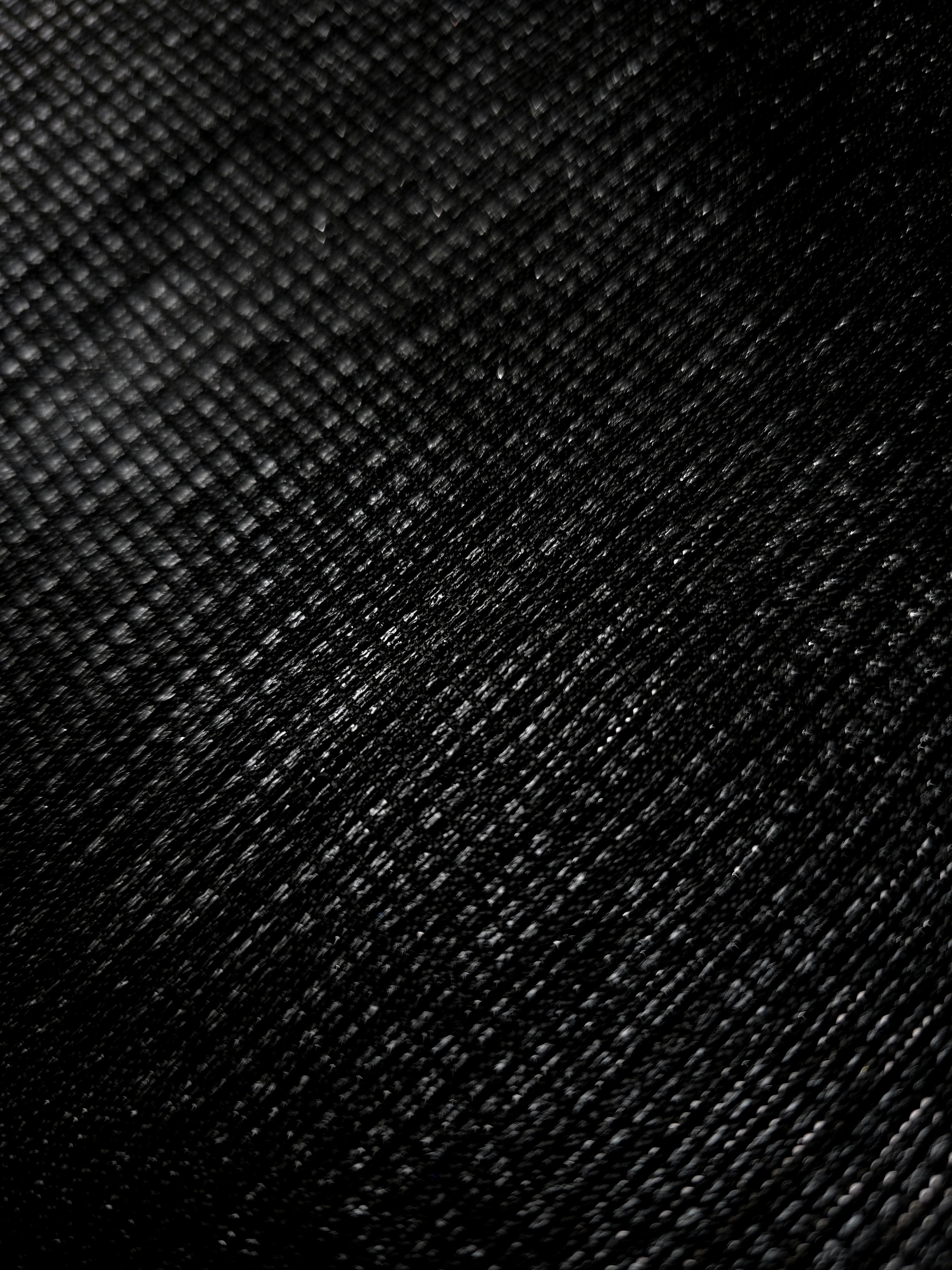Close-up of Charcoal Silver Sheer Square Shimmer Stretch Tulle Fabric revealing the square shimmer repeat and fine transparent mesh