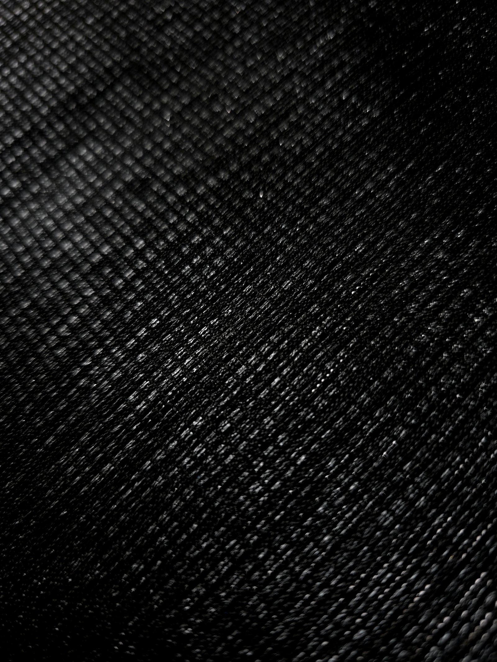 Close-up of Charcoal Silver Sheer Square Shimmer Stretch Tulle Fabric revealing the square shimmer repeat and fine transparent mesh