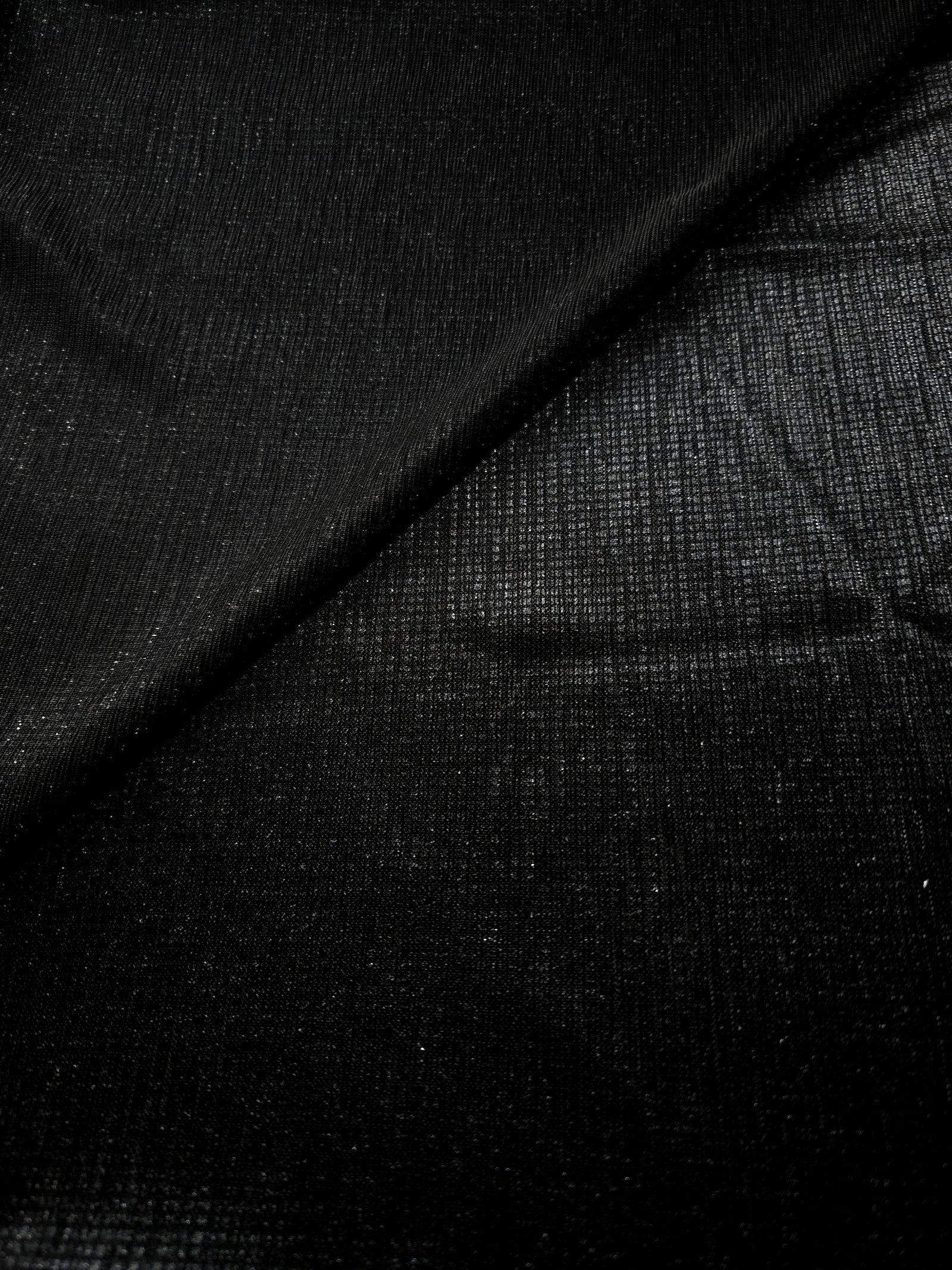 Front and back of Charcoal Silver Sheer Square Shimmer Stretch Tulle Fabric showing square motif, sheer knit base and flexible stretch