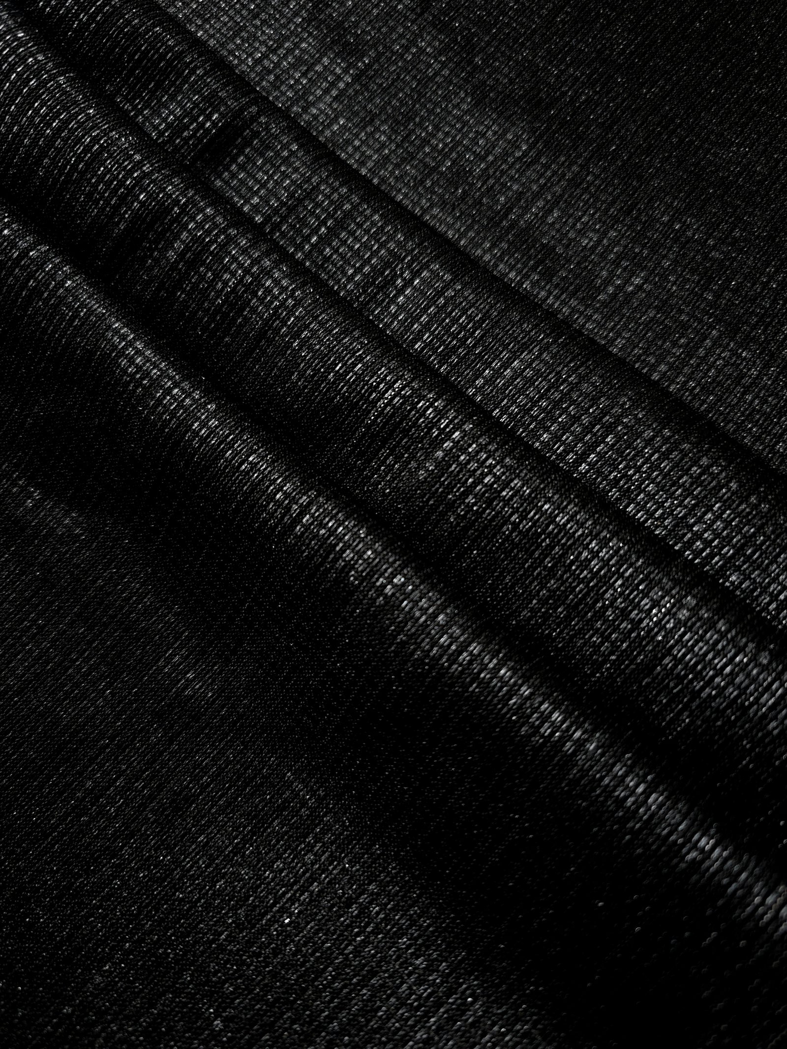 Layered Charcoal Silver Sheer Square Shimmer Stretch Tulle Fabric showing overlapping geometry, denser shimmer and translucent depth