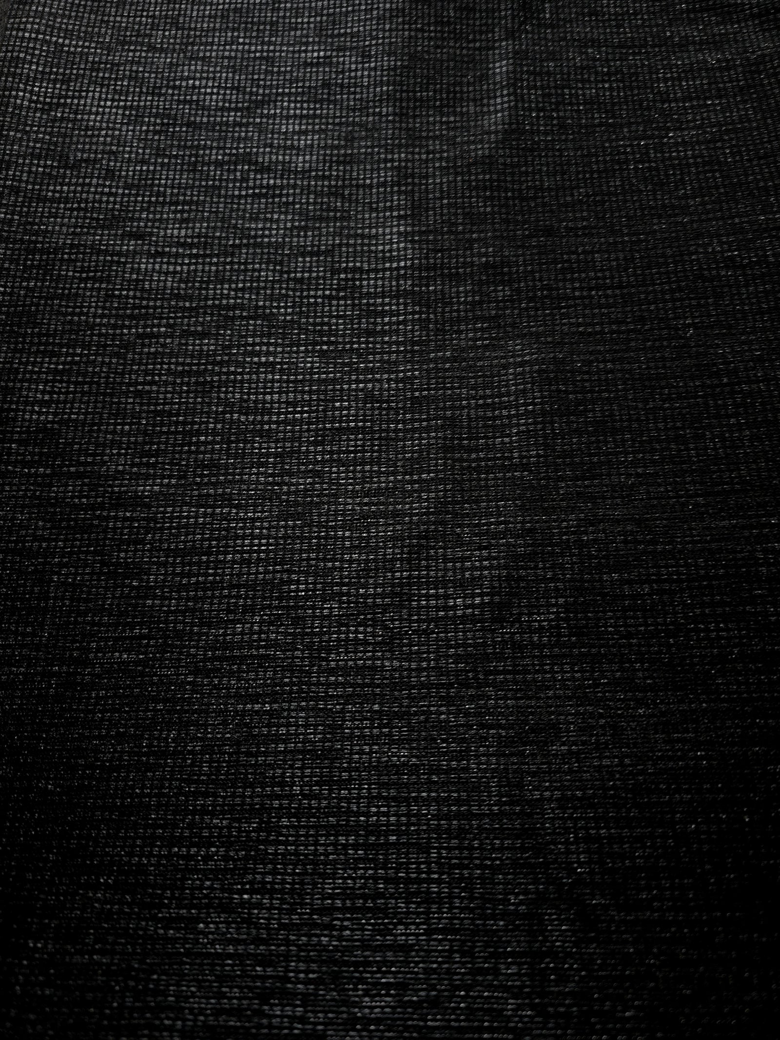 Surface detail of Charcoal Silver Sheer Square Shimmer Stretch Tulle Fabric highlighting square grid scale and lightweight tulle texture