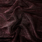 Draped Dark Pink Sheer Square Shimmer Stretch Tulle Fabric showing a geometric reflective grid across fluid folds