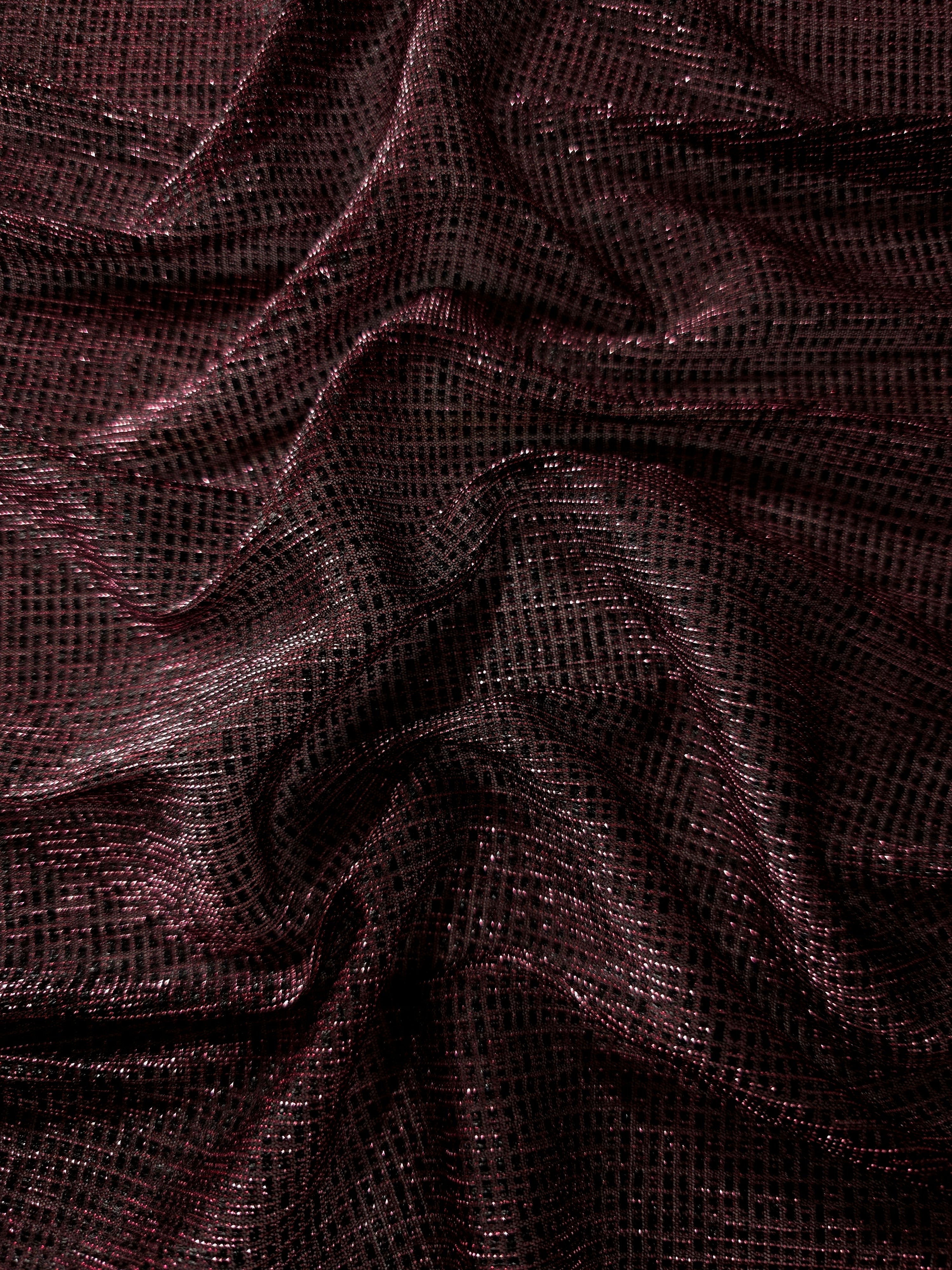 Draped Dark Pink Sheer Square Shimmer Stretch Tulle Fabric showing a geometric reflective grid across fluid folds