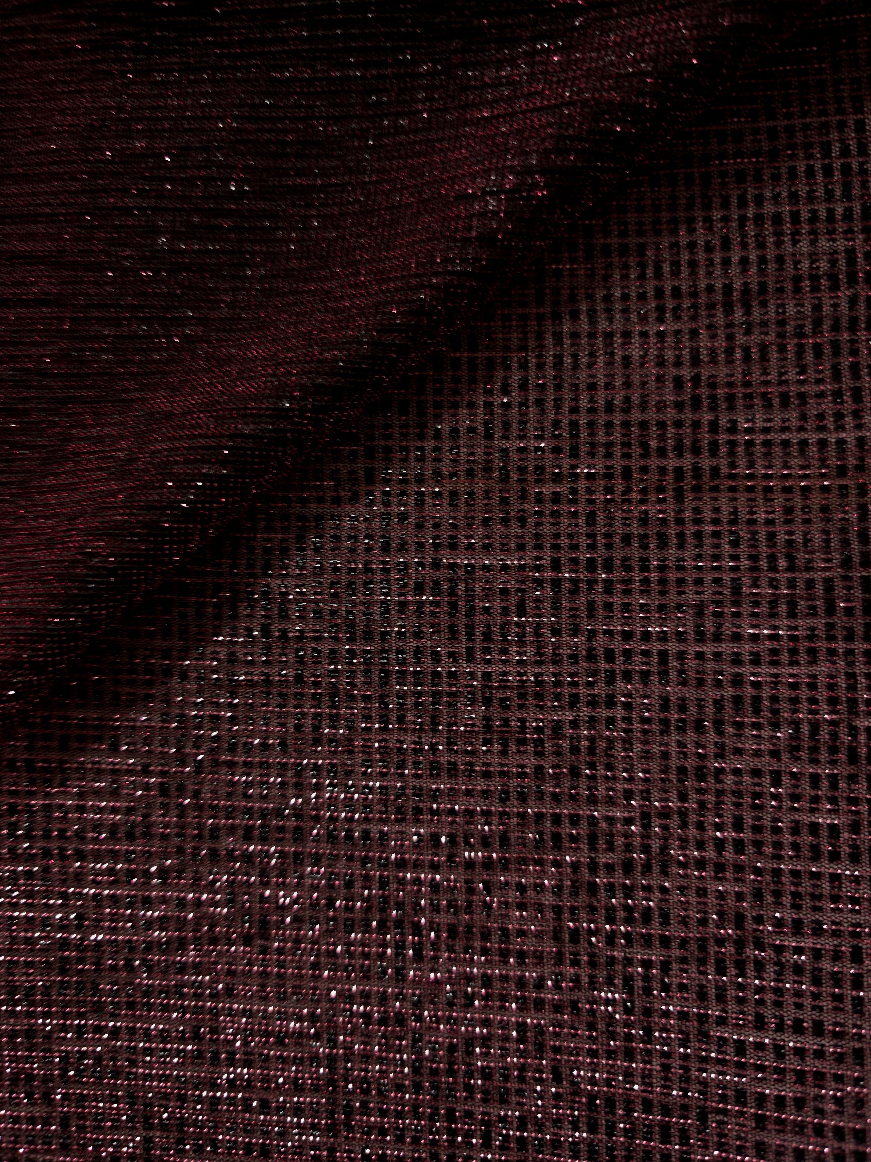 Front and back of Dark Pink Sheer Square Shimmer Stretch Tulle Fabric showing square motif, sheer knit base and flexible stretch