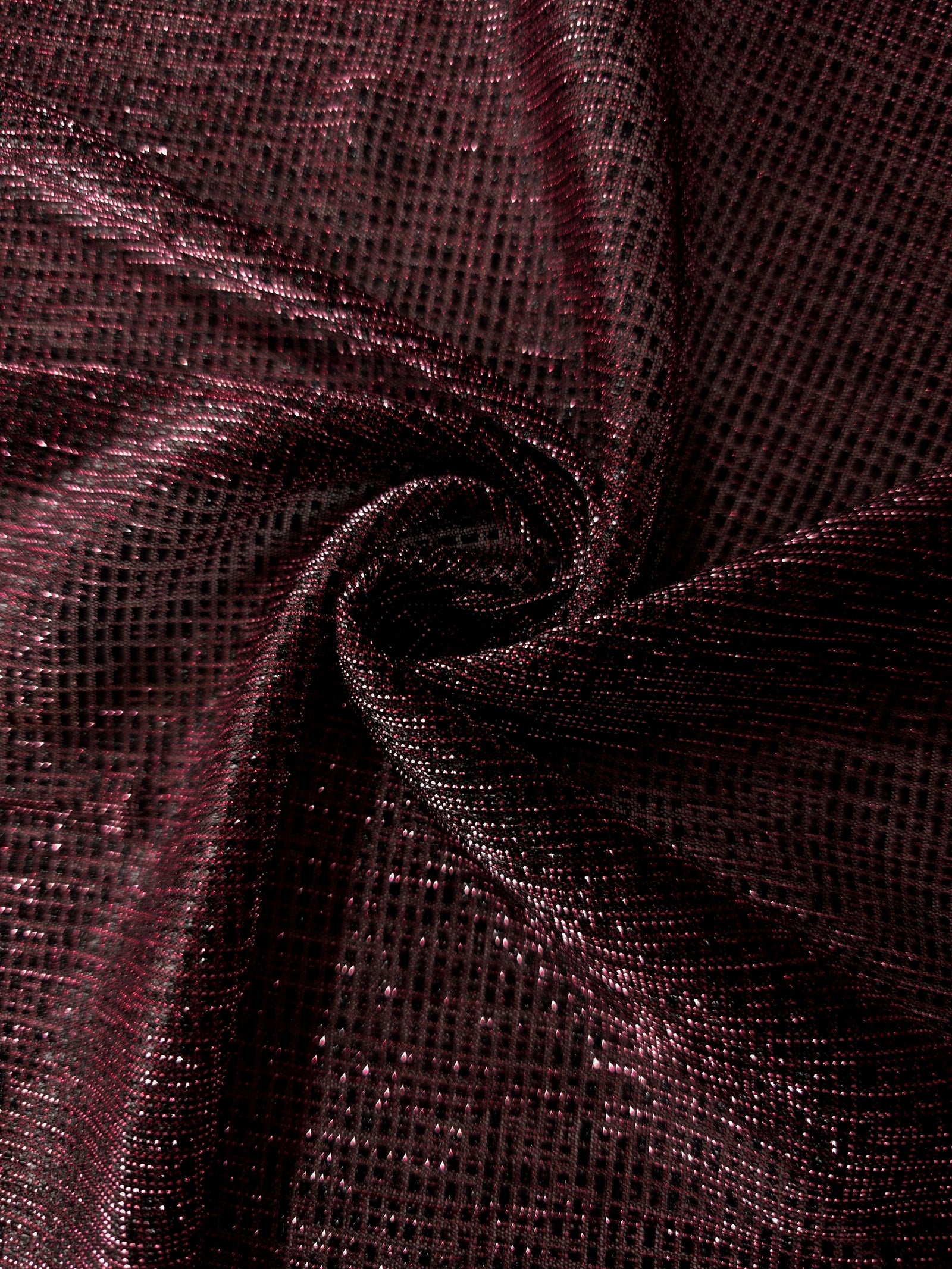 Layered Dark Pink Sheer Square Shimmer Stretch Tulle Fabric showing overlapping geometry, denser shimmer and translucent depth