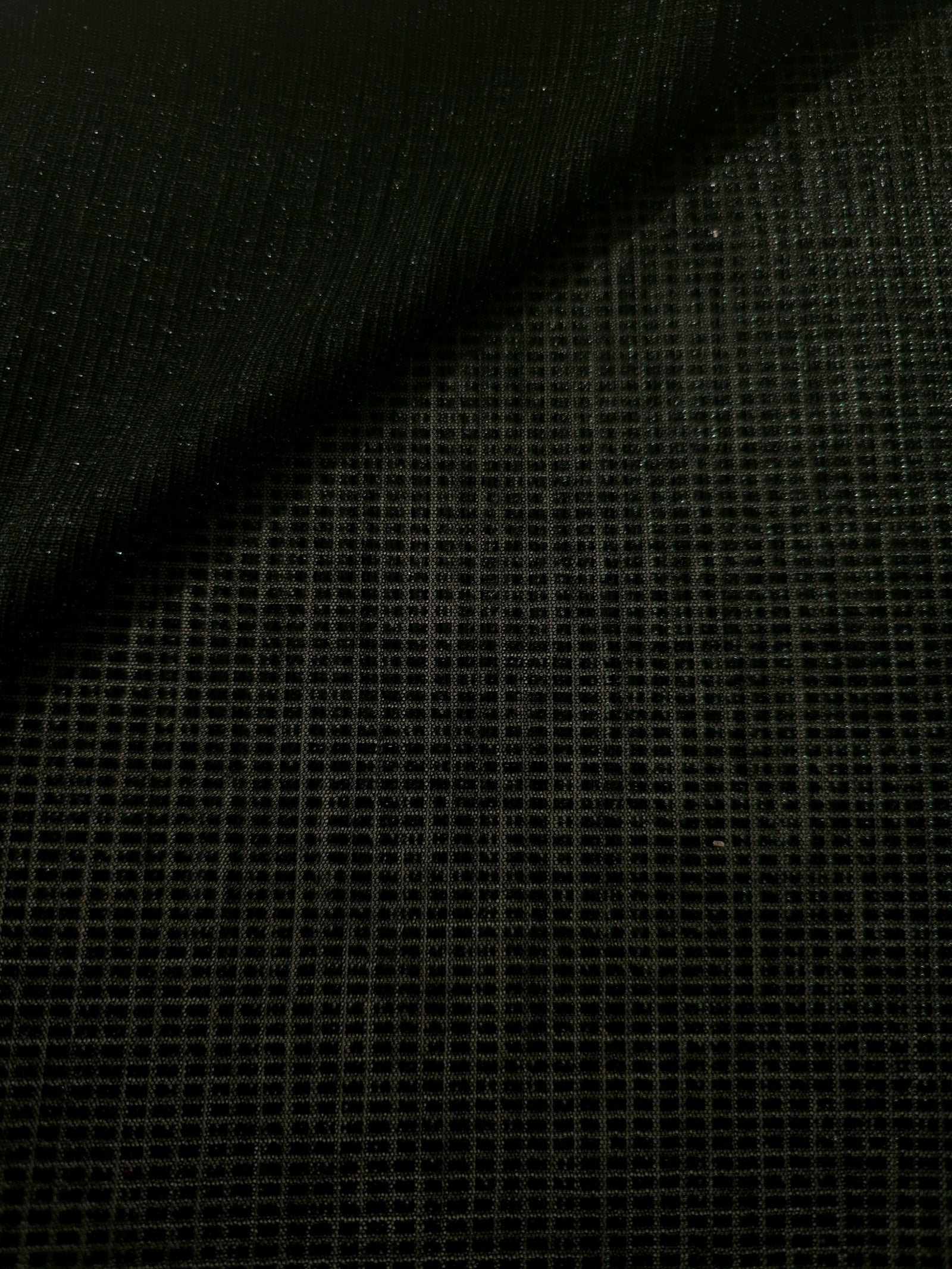 Front and back of Deep Emerald Sheer Square Shimmer Stretch Tulle Fabric showing square motif, sheer knit base and flexible stretch