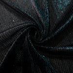 Swirl-draped Deep Teal Sheer Square Shimmer Stretch Tulle Fabric showing structured square reflections moving through soft folds