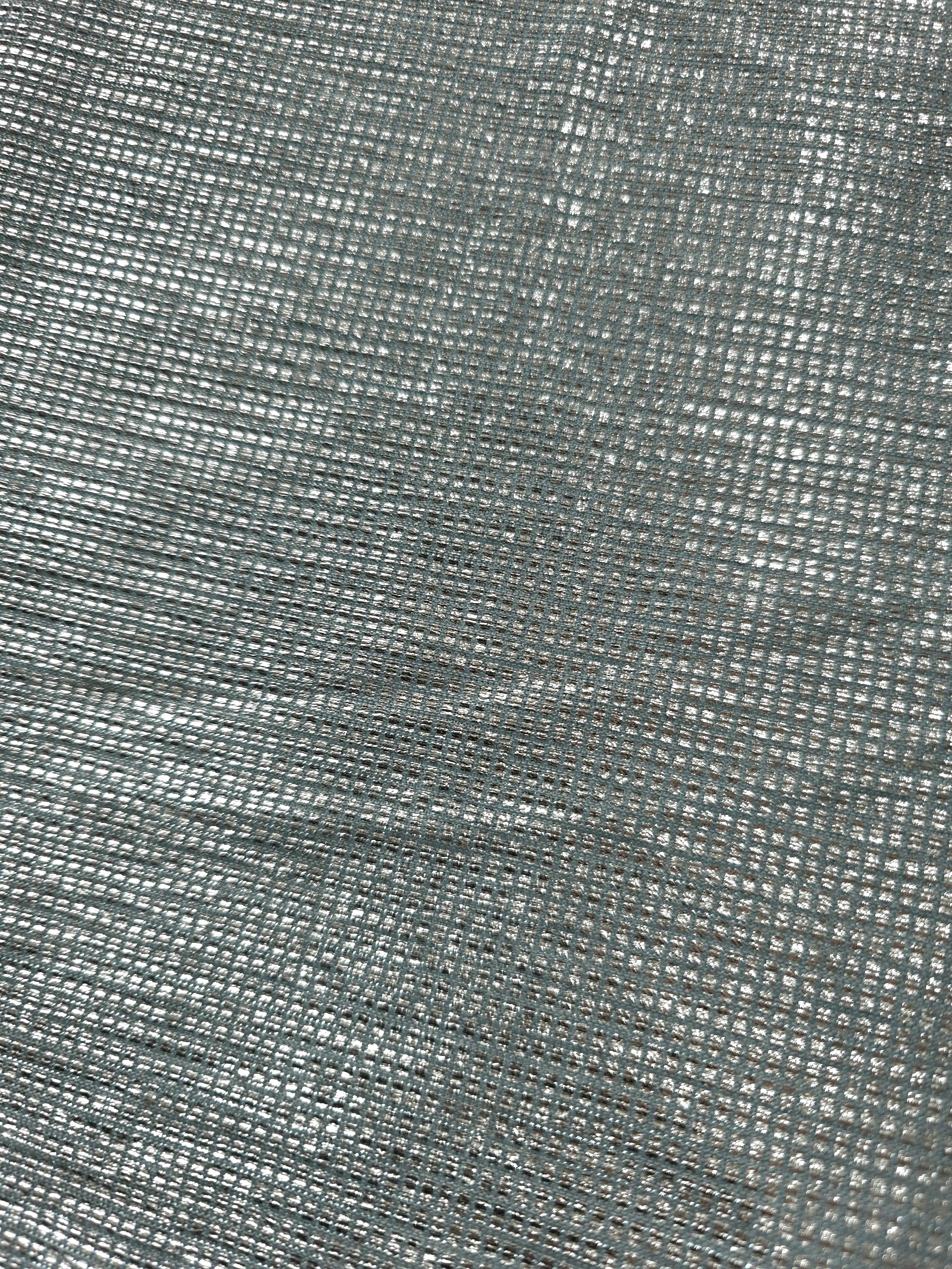 Close-up of Icy Silver Sheer Square Shimmer Stretch Tulle Fabric revealing the square shimmer repeat and fine transparent mesh