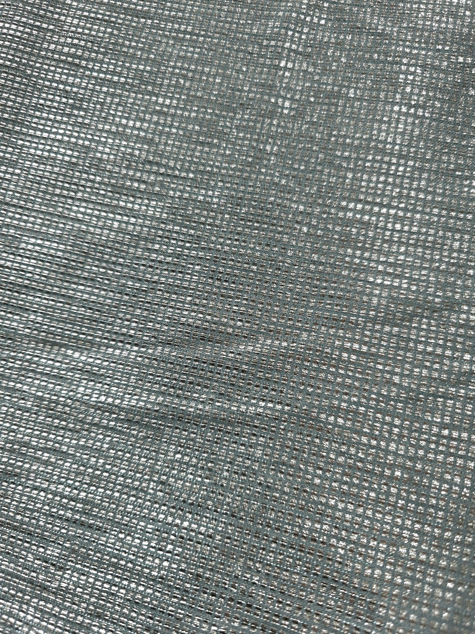 Close-up of Icy Silver Sheer Square Shimmer Stretch Tulle Fabric revealing the square shimmer repeat and fine transparent mesh