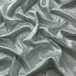Draped Icy Silver Sheer Square Shimmer Stretch Tulle Fabric showing a geometric reflective grid across fluid folds