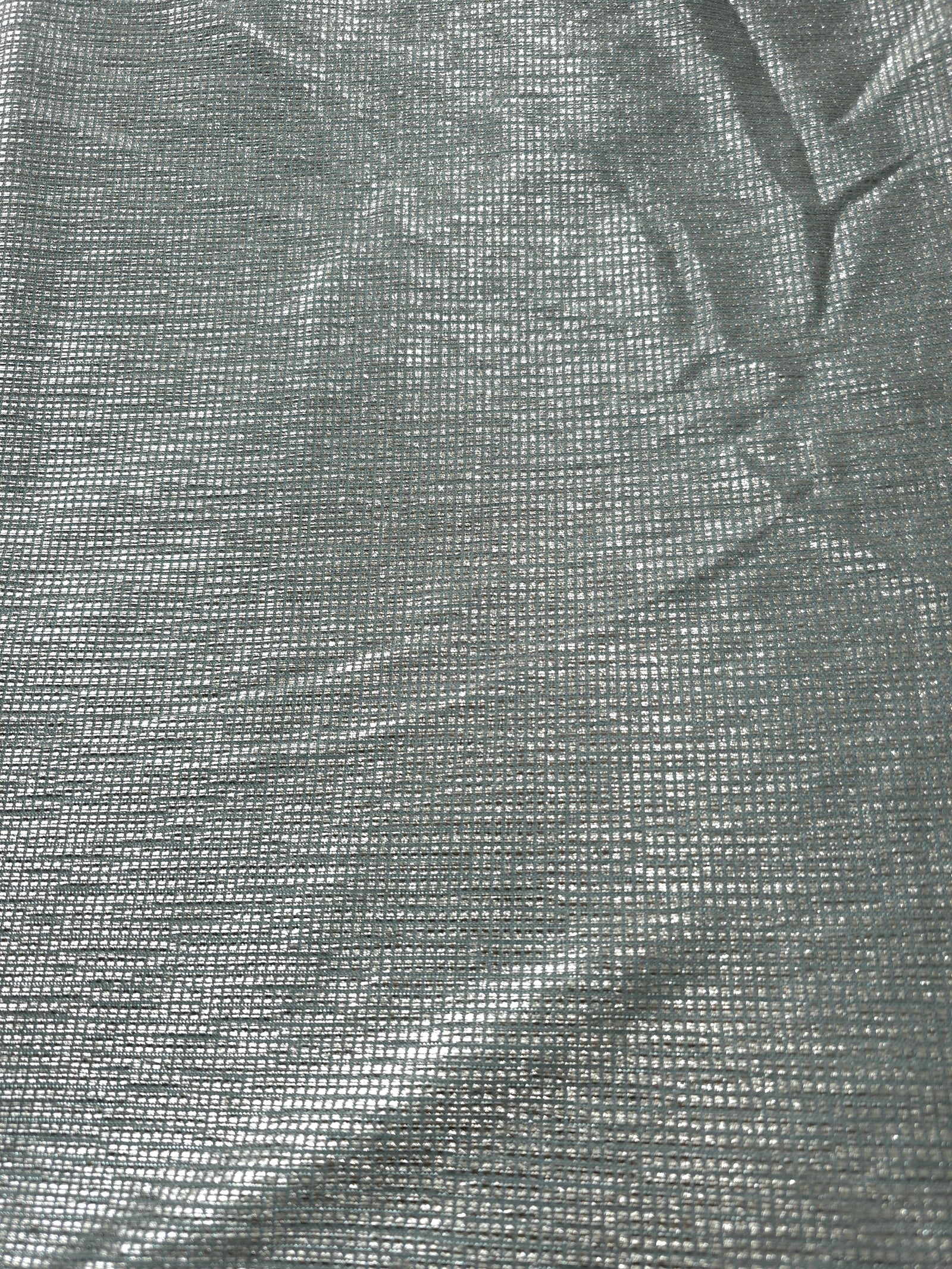 Surface detail of Icy Silver Sheer Square Shimmer Stretch Tulle Fabric highlighting square grid scale and lightweight tulle texture