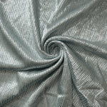 Swirl-draped Icy Silver Sheer Square Shimmer Stretch Tulle Fabric showing structured square reflections moving through soft folds