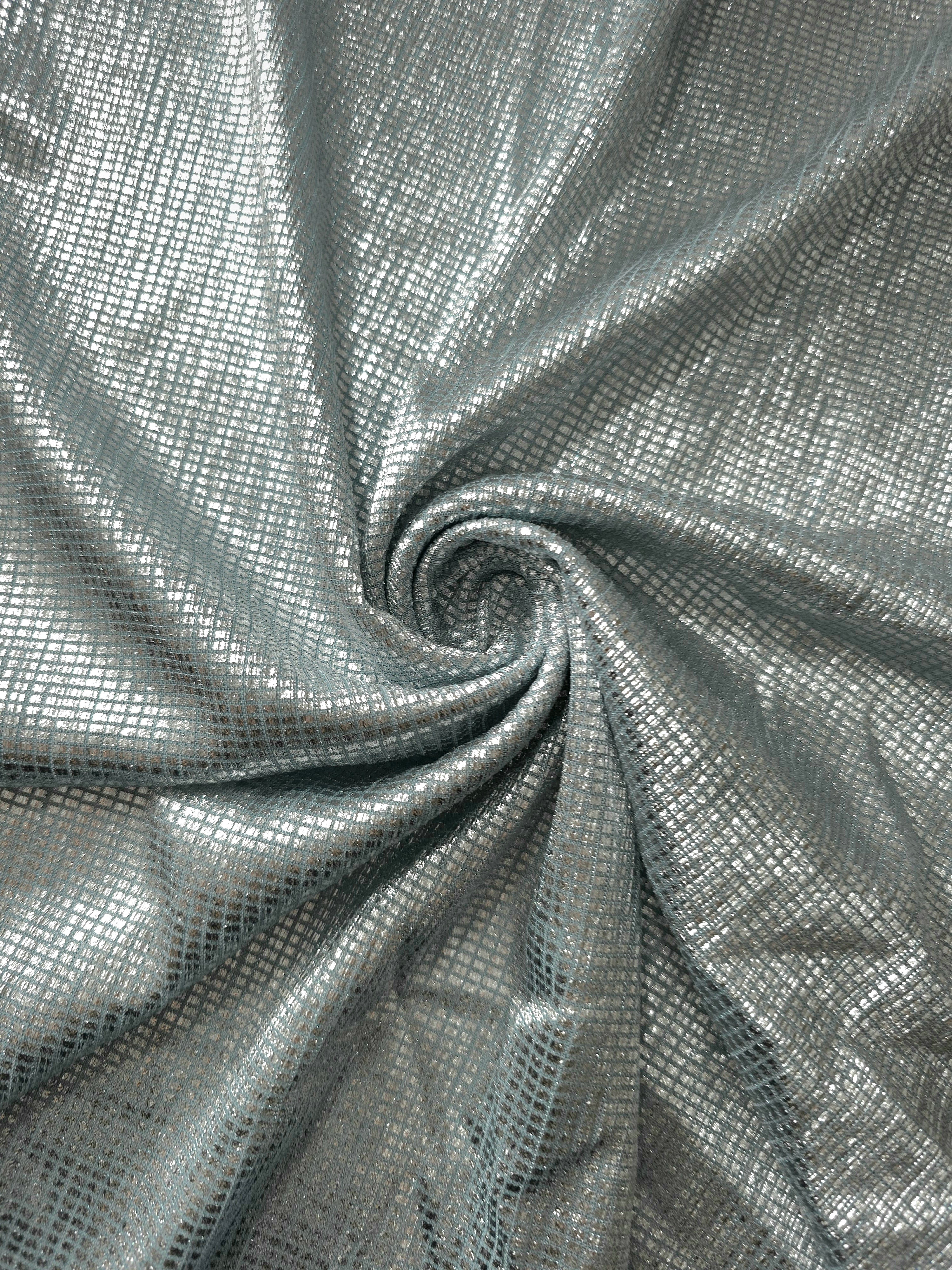 Swirl-draped Icy Silver Sheer Square Shimmer Stretch Tulle Fabric showing structured square reflections moving through soft folds