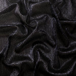 Draped Midnight Indigo Sheer Square Shimmer Stretch Tulle Fabric showing a geometric reflective grid across fluid folds