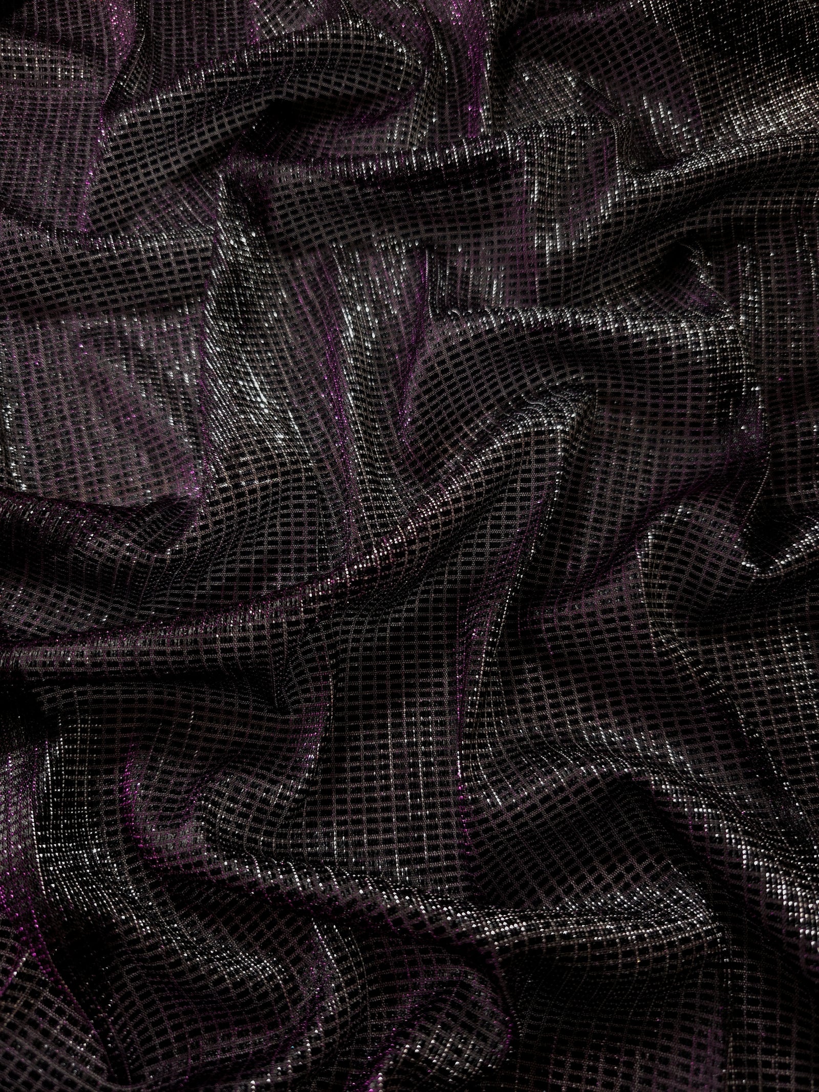 Front and back of Plum Violet Sheer Square Shimmer Stretch Tulle Fabric showing square motif, sheer knit base and flexible stretch