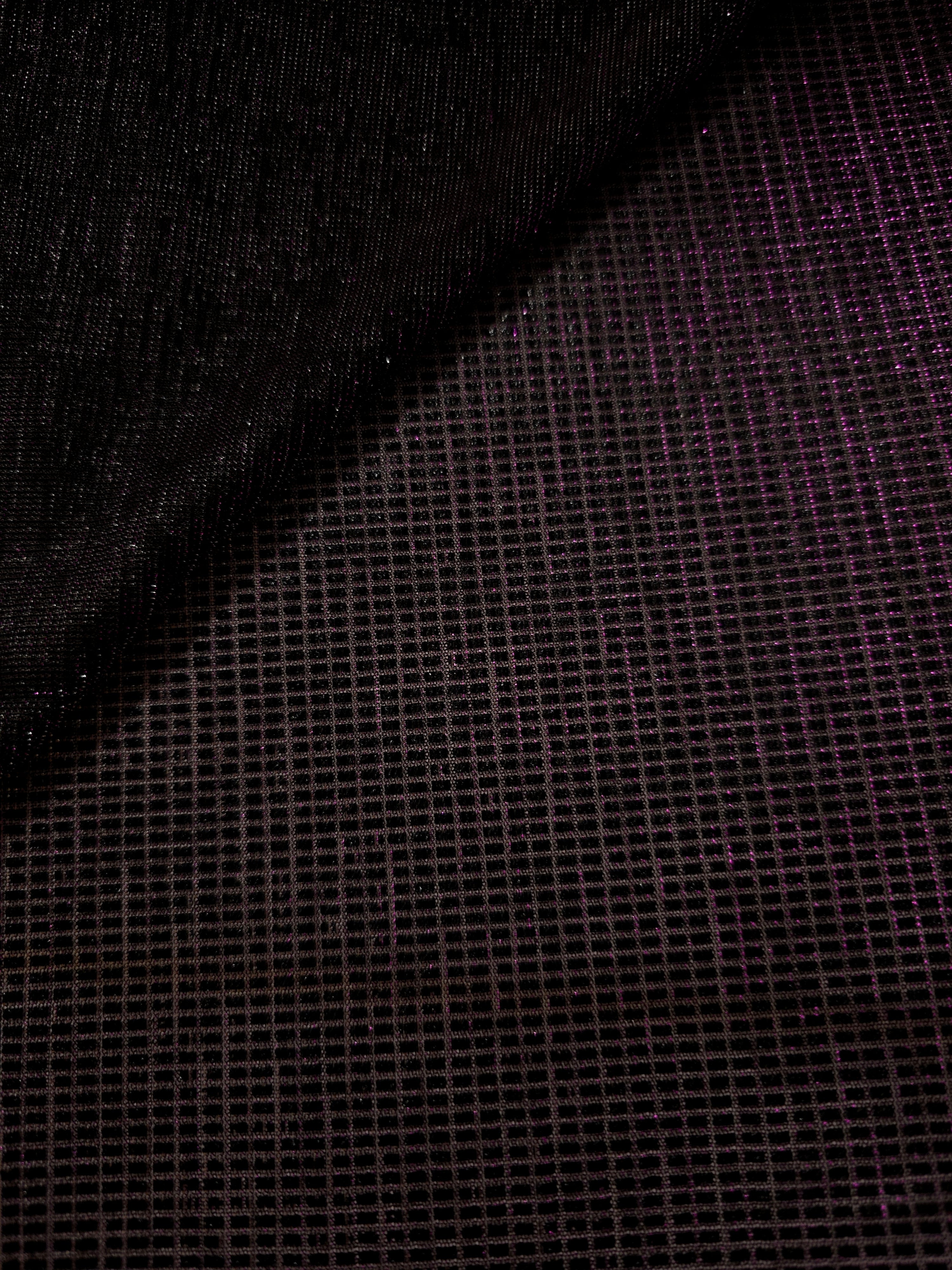 Layered Plum Violet Sheer Square Shimmer Stretch Tulle Fabric showing overlapping geometry, denser shimmer and translucent depth