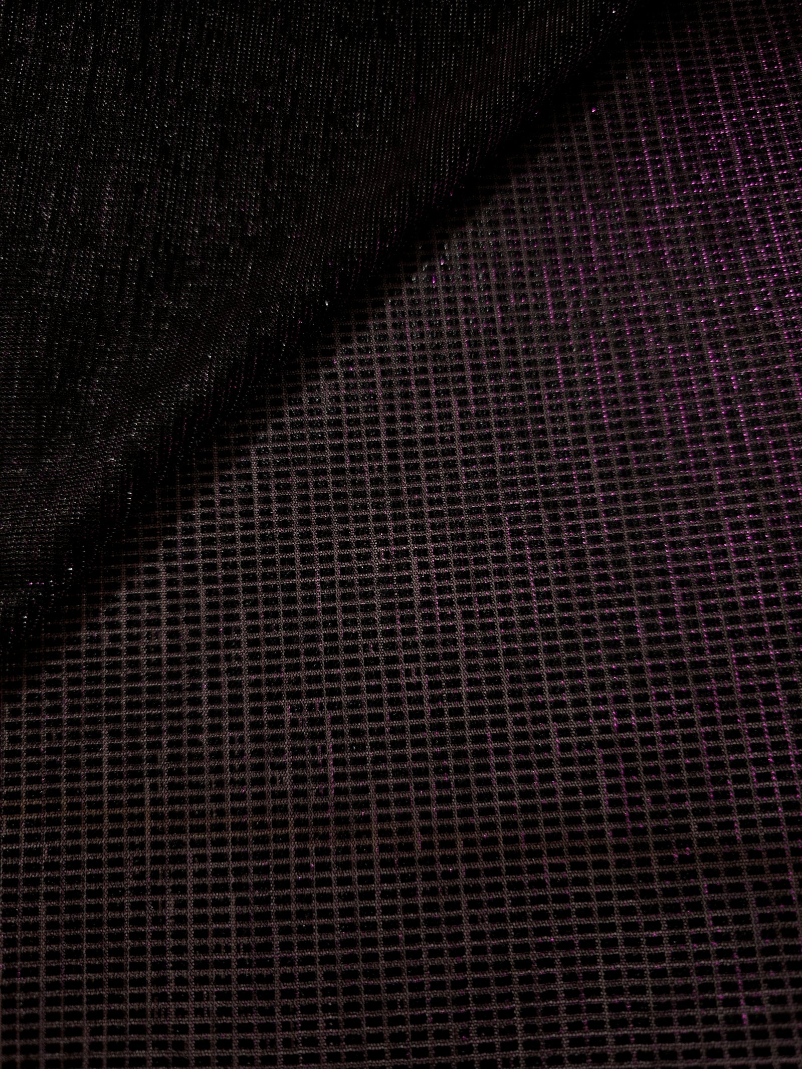 Layered Plum Violet Sheer Square Shimmer Stretch Tulle Fabric showing overlapping geometry, denser shimmer and translucent depth