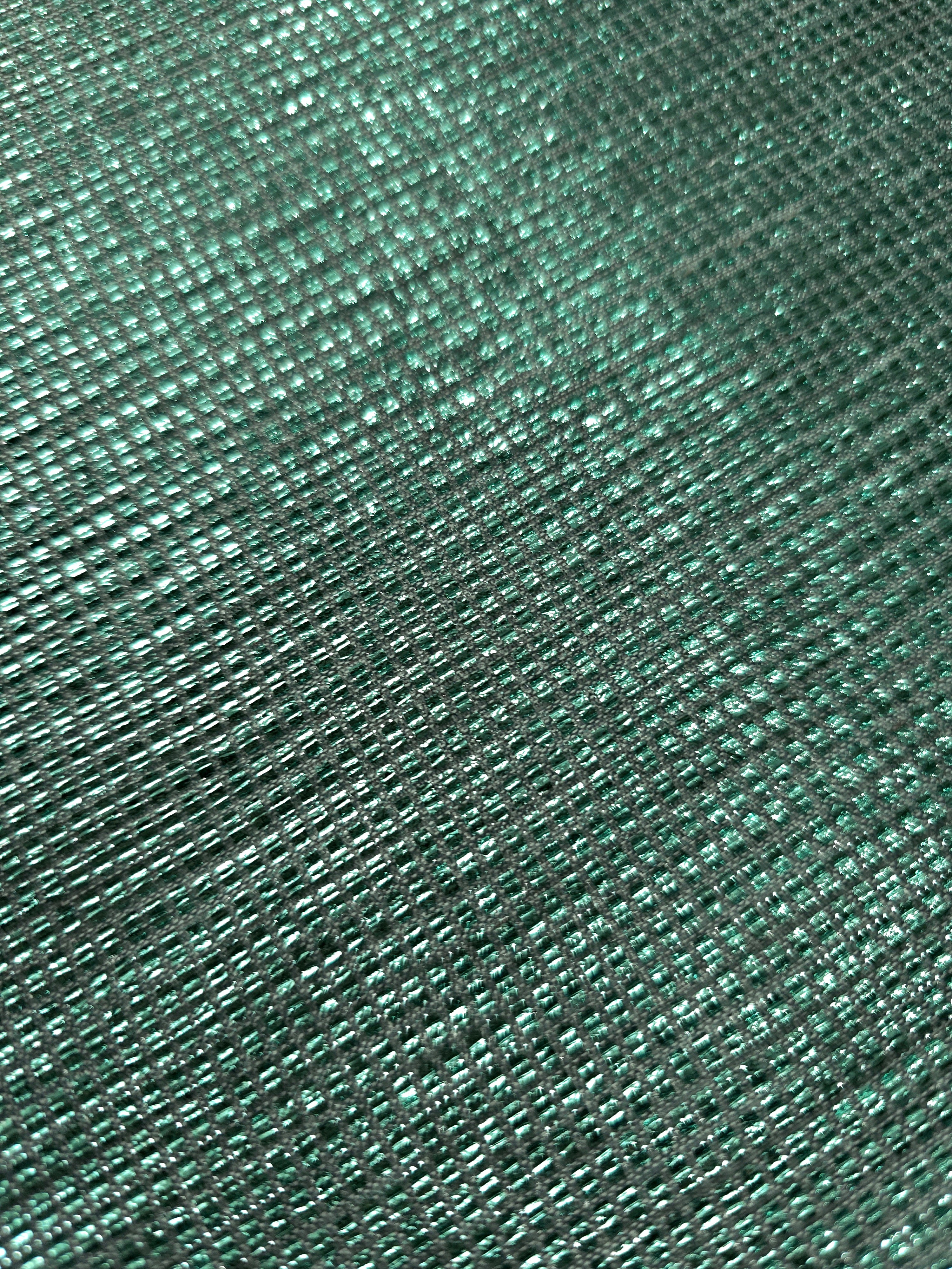 Close-up of Sage Green Sheer Square Shimmer Stretch Tulle Fabric revealing the square shimmer repeat and fine transparent mesh