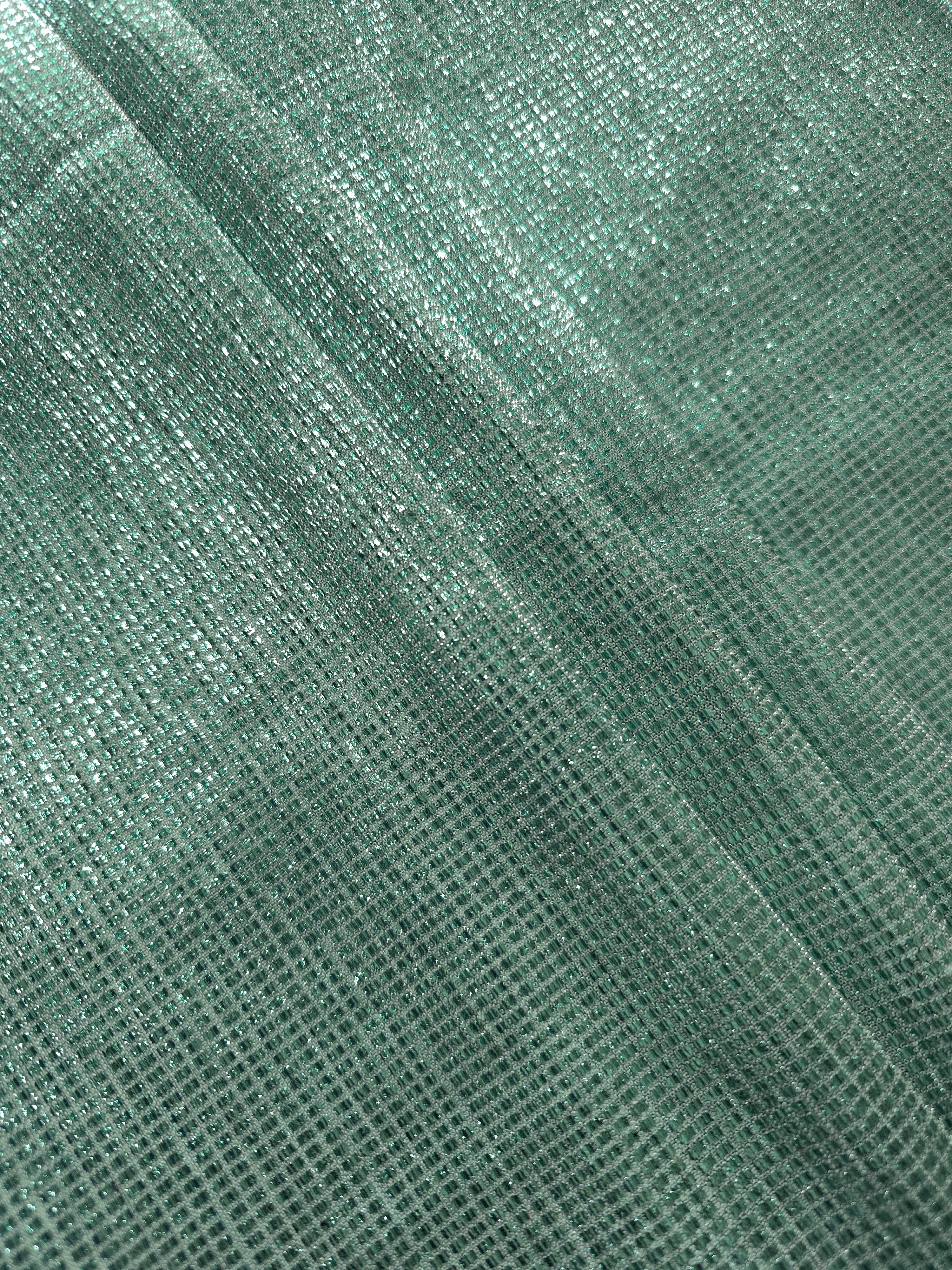 Layered Sage Green Sheer Square Shimmer Stretch Tulle Fabric showing overlapping geometry, denser shimmer and translucent depth
