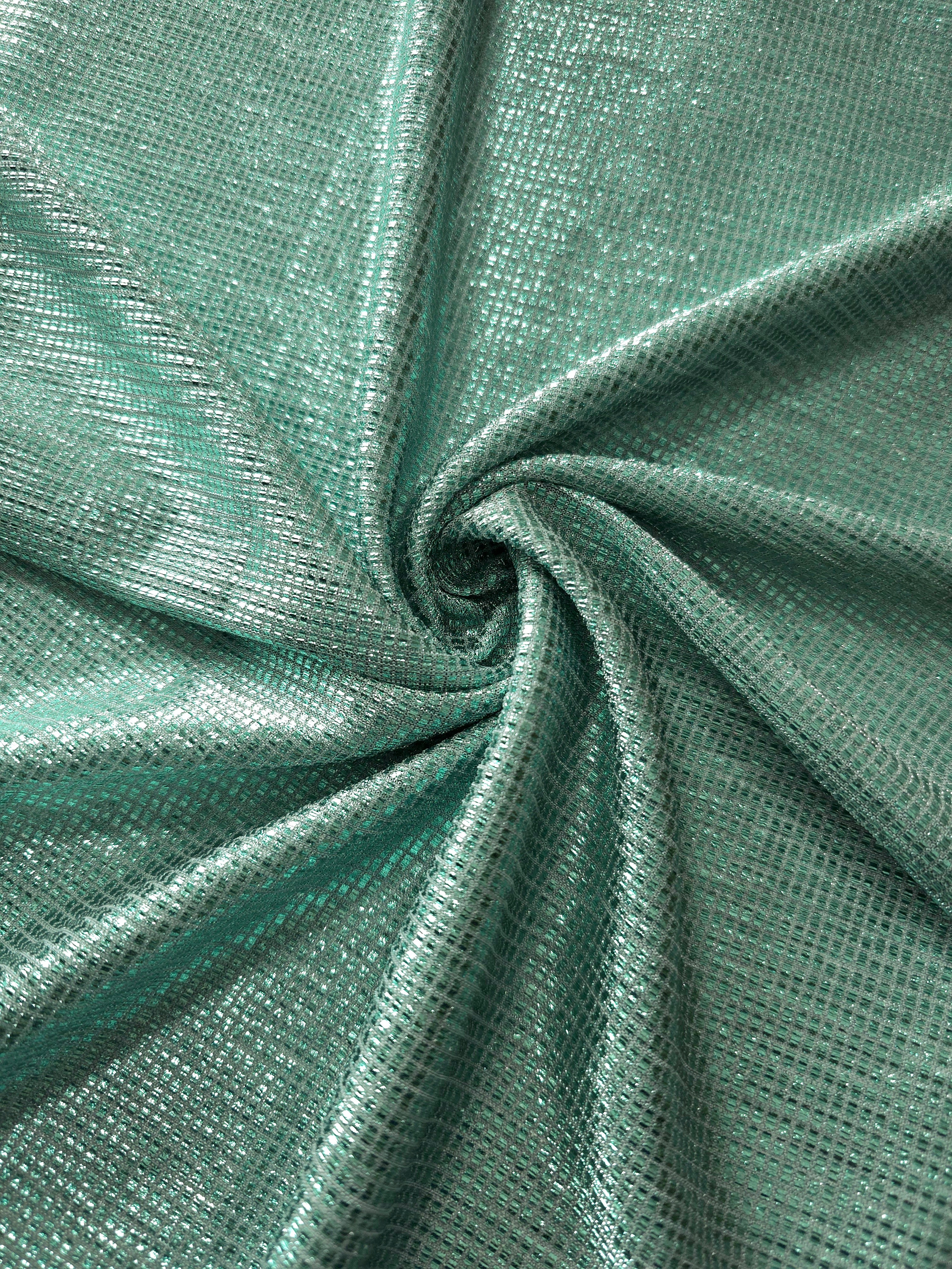 Swirl-draped Sage Green Sheer Square Shimmer Stretch Tulle Fabric showing structured square reflections moving through soft folds