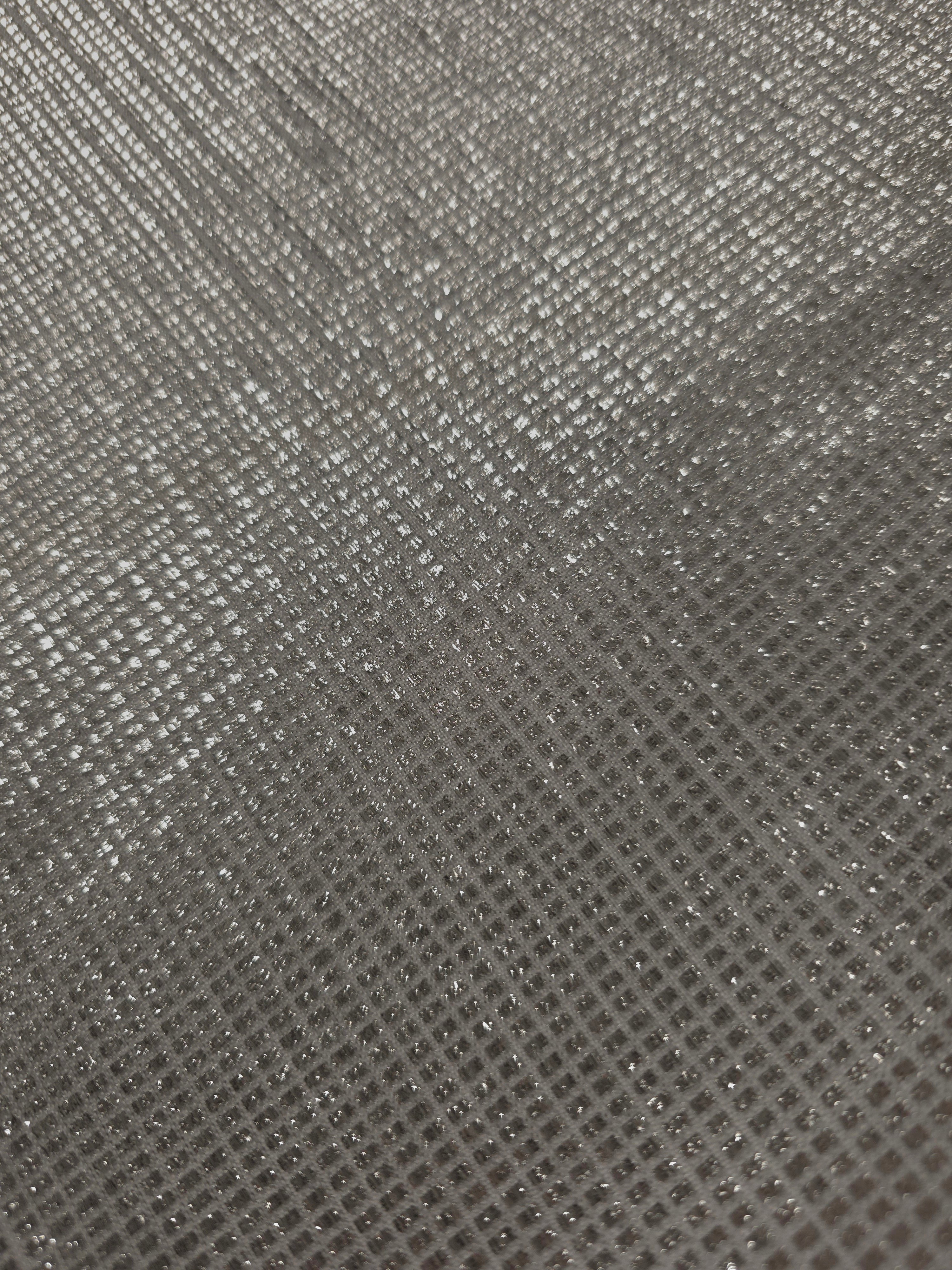 Close-up of Silver Gray Sheer Square Shimmer Stretch Tulle Fabric revealing the square shimmer repeat and fine transparent mesh
