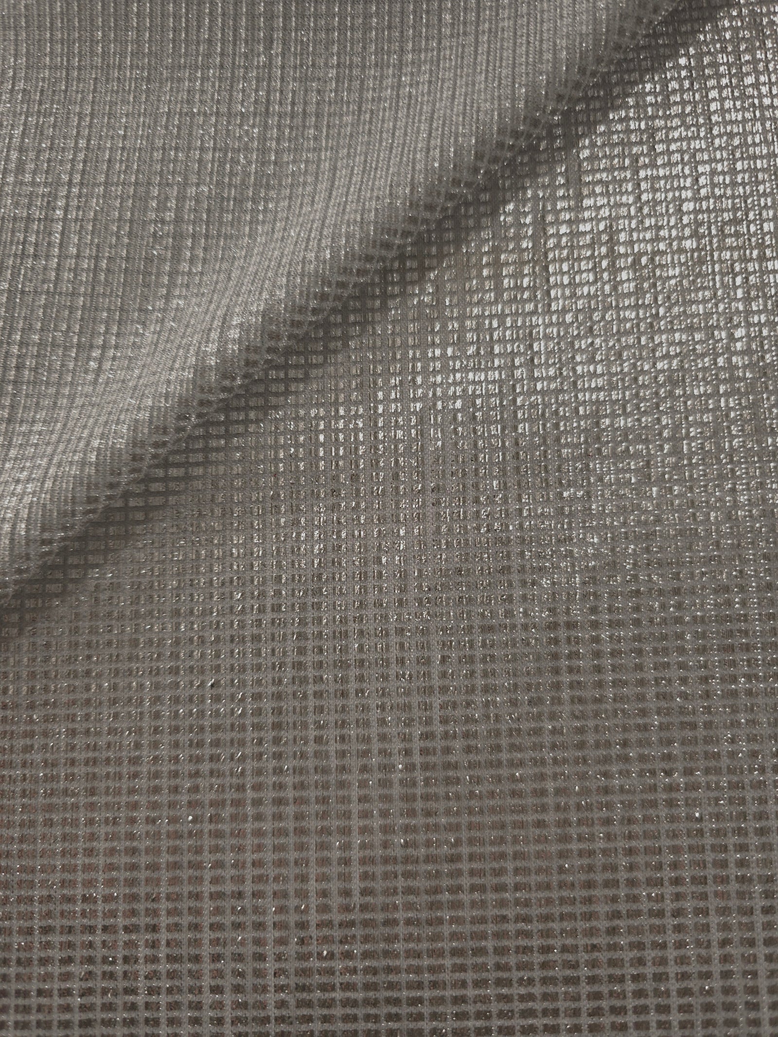 Front and back of Silver Gray Sheer Square Shimmer Stretch Tulle Fabric showing square motif, sheer knit base and flexible stretch