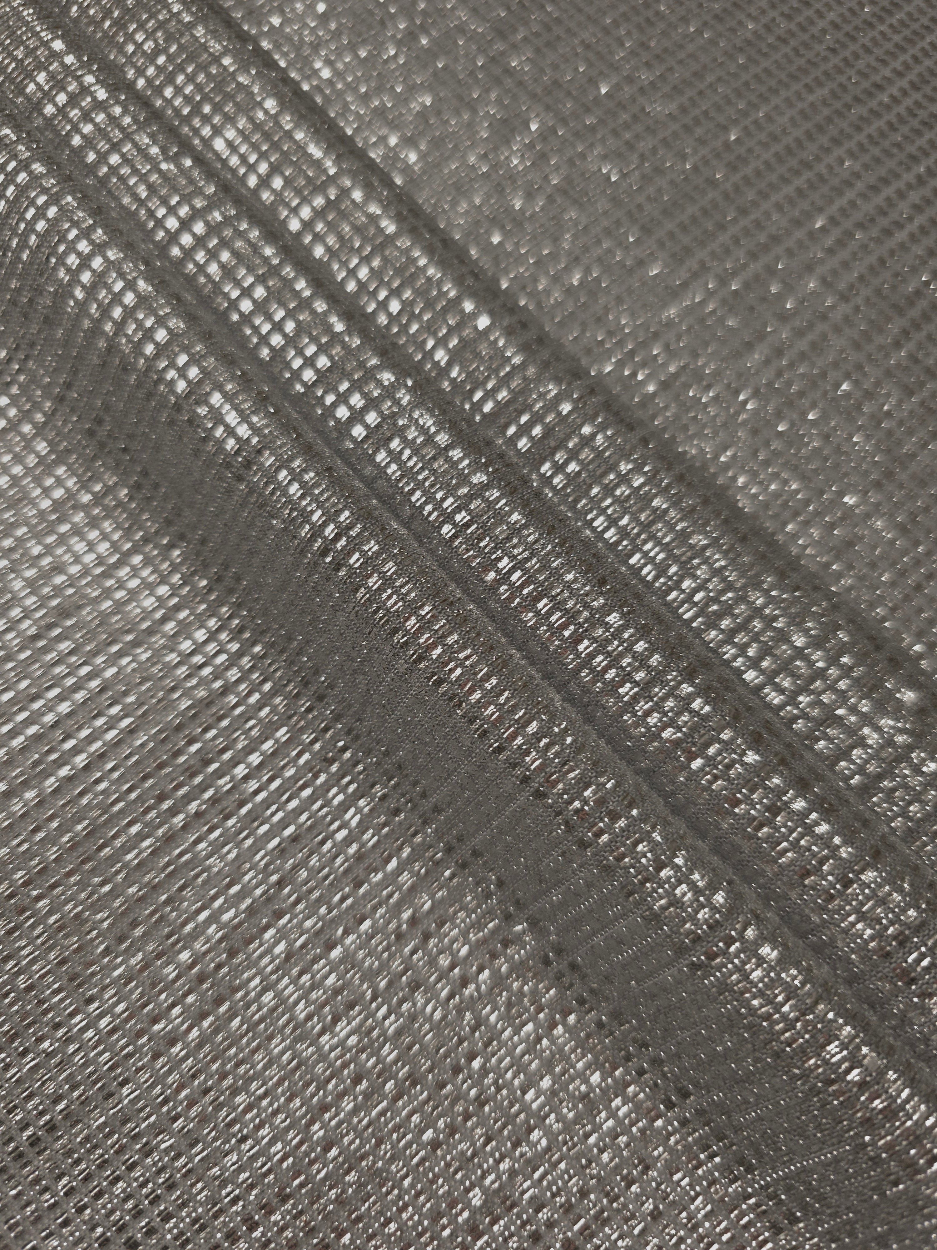 Layered Silver Gray Sheer Square Shimmer Stretch Tulle Fabric showing overlapping geometry, denser shimmer and translucent depth