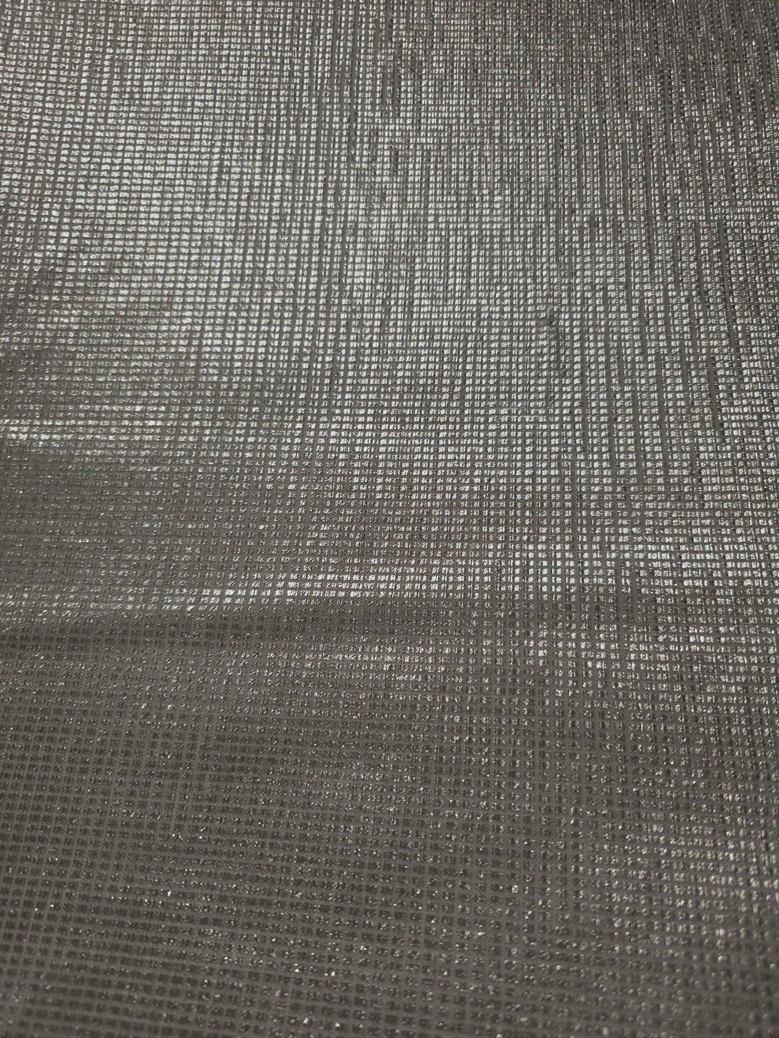 Surface detail of Silver Gray Sheer Square Shimmer Stretch Tulle Fabric highlighting square grid scale and lightweight tulle texture