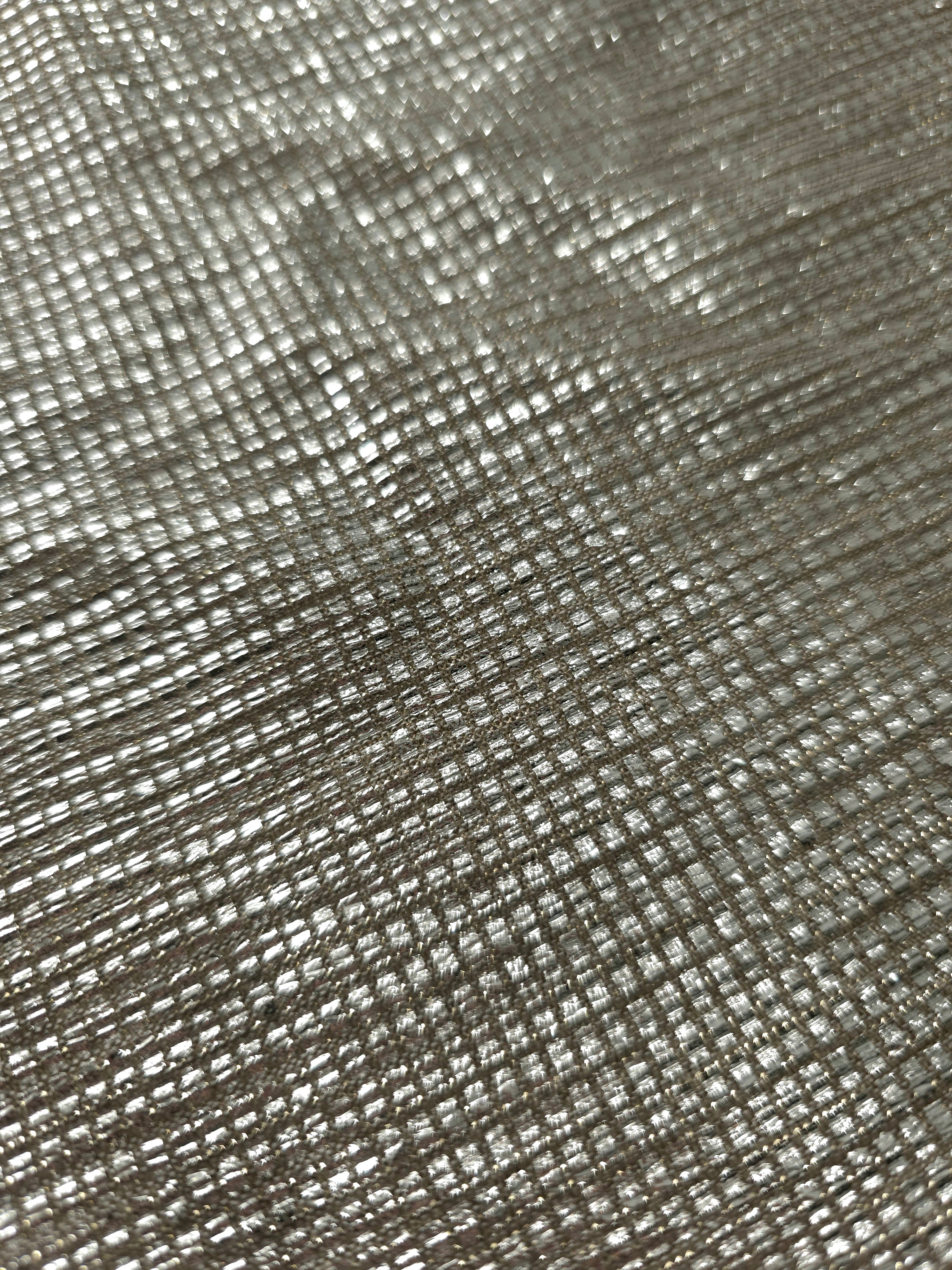 Close-up of Vanilla Cream Sheer Square Shimmer Stretch Tulle Fabric revealing the square shimmer repeat and fine transparent mesh