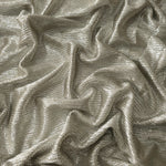 Draped Vanilla Cream Sheer Square Shimmer Stretch Tulle Fabric showing a geometric reflective grid across fluid folds
