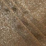 Layered Antique Gold Sheer Glitter Stretch Tulle Fabric showing richer sparkle, soft depth and lightweight transparent folds