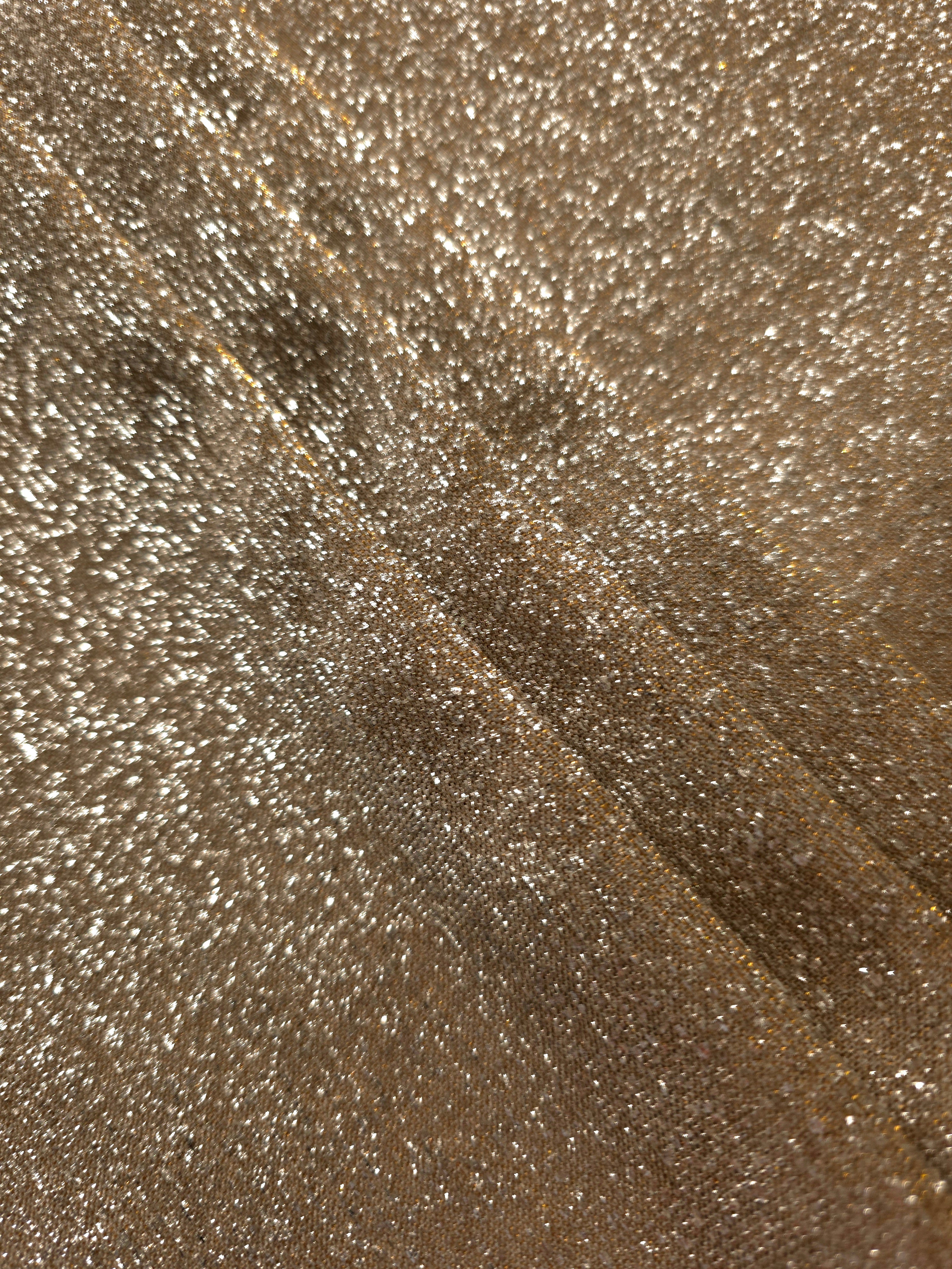 Layered Antique Gold Sheer Glitter Stretch Tulle Fabric showing richer sparkle, soft depth and lightweight transparent folds