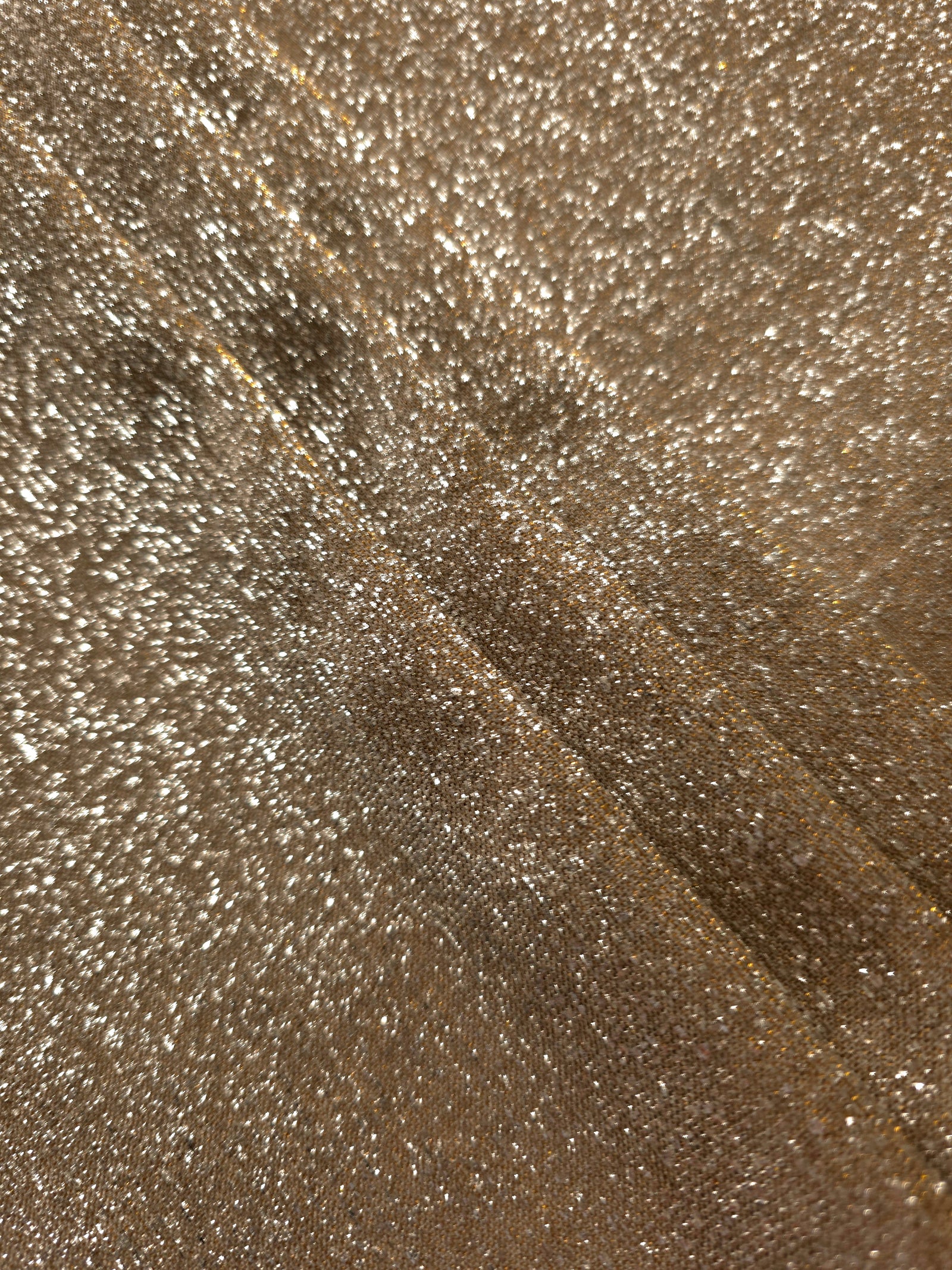 Layered Antique Gold Sheer Glitter Stretch Tulle Fabric showing richer sparkle, soft depth and lightweight transparent folds