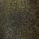Surface detail of Black Gold Sheer Glitter Stretch Tulle Fabric showing glitter coverage across the fine sheer tulle base