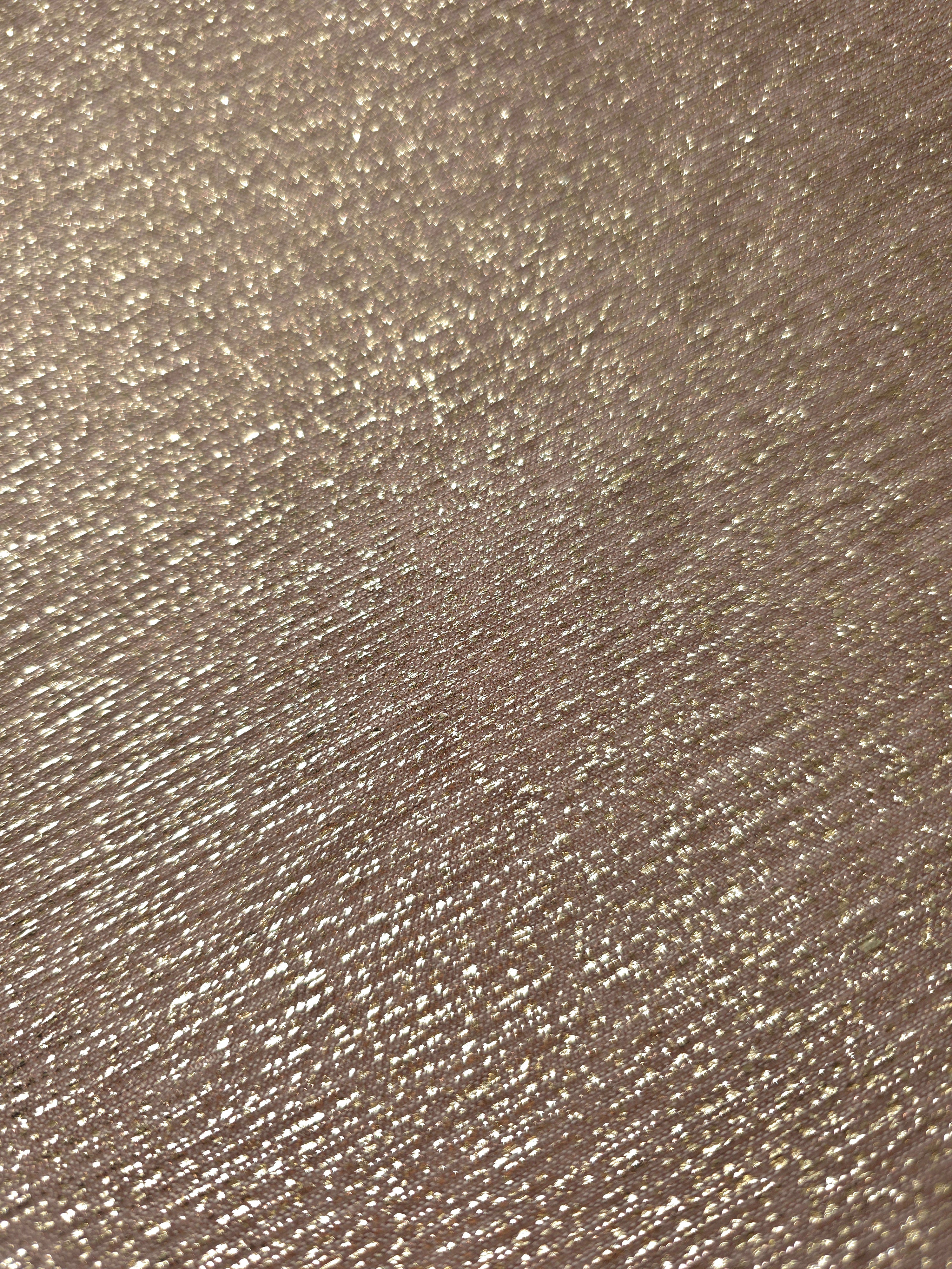 Close-up of Champagne Beige Sheer Glitter Stretch Tulle Fabric highlighting all-over glitter, fine mesh texture and airy transparency