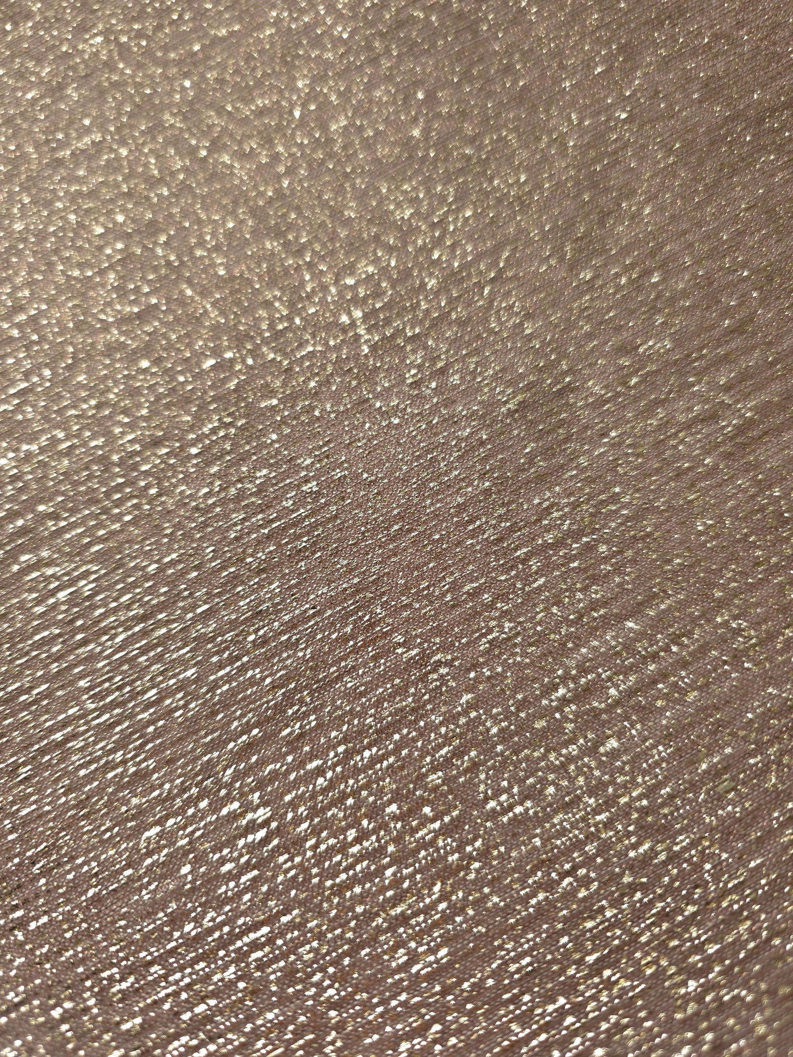 Close-up of Champagne Beige Sheer Glitter Stretch Tulle Fabric highlighting all-over glitter, fine mesh texture and airy transparency