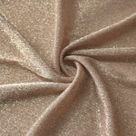 Swirl-draped Champagne Beige Sheer Glitter Stretch Tulle Fabric capturing reflective sparkle and fluid movement through flexible folds