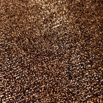 Close-up of Copper Bronze Sheer Glitter Stretch Tulle Fabric highlighting all-over glitter, fine mesh texture and airy transparency